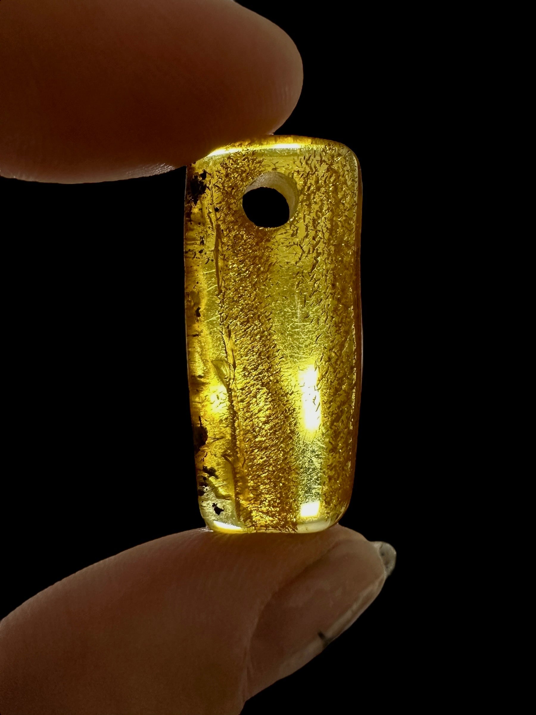 Amber with a drilled hole for hanging 1,8g – Lithuania - JND12