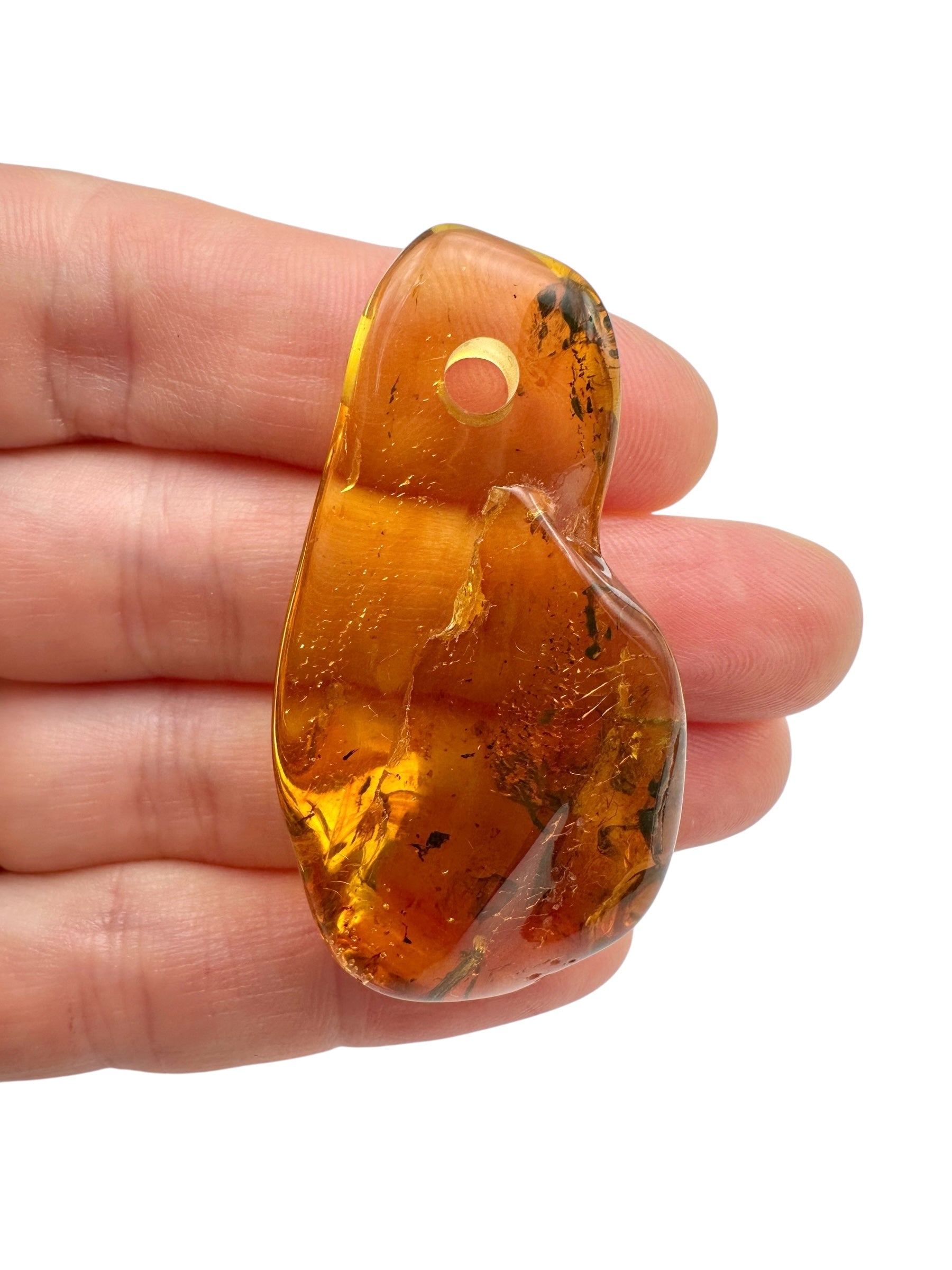 Amber with a drilled hole for hanging 5,5g – Lithuania