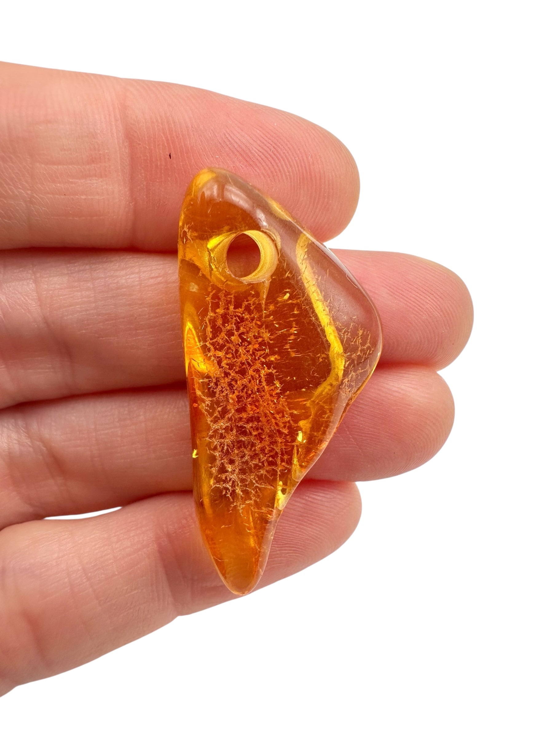 Amber with a drilled hole for hanging 2,4g – Lithuania