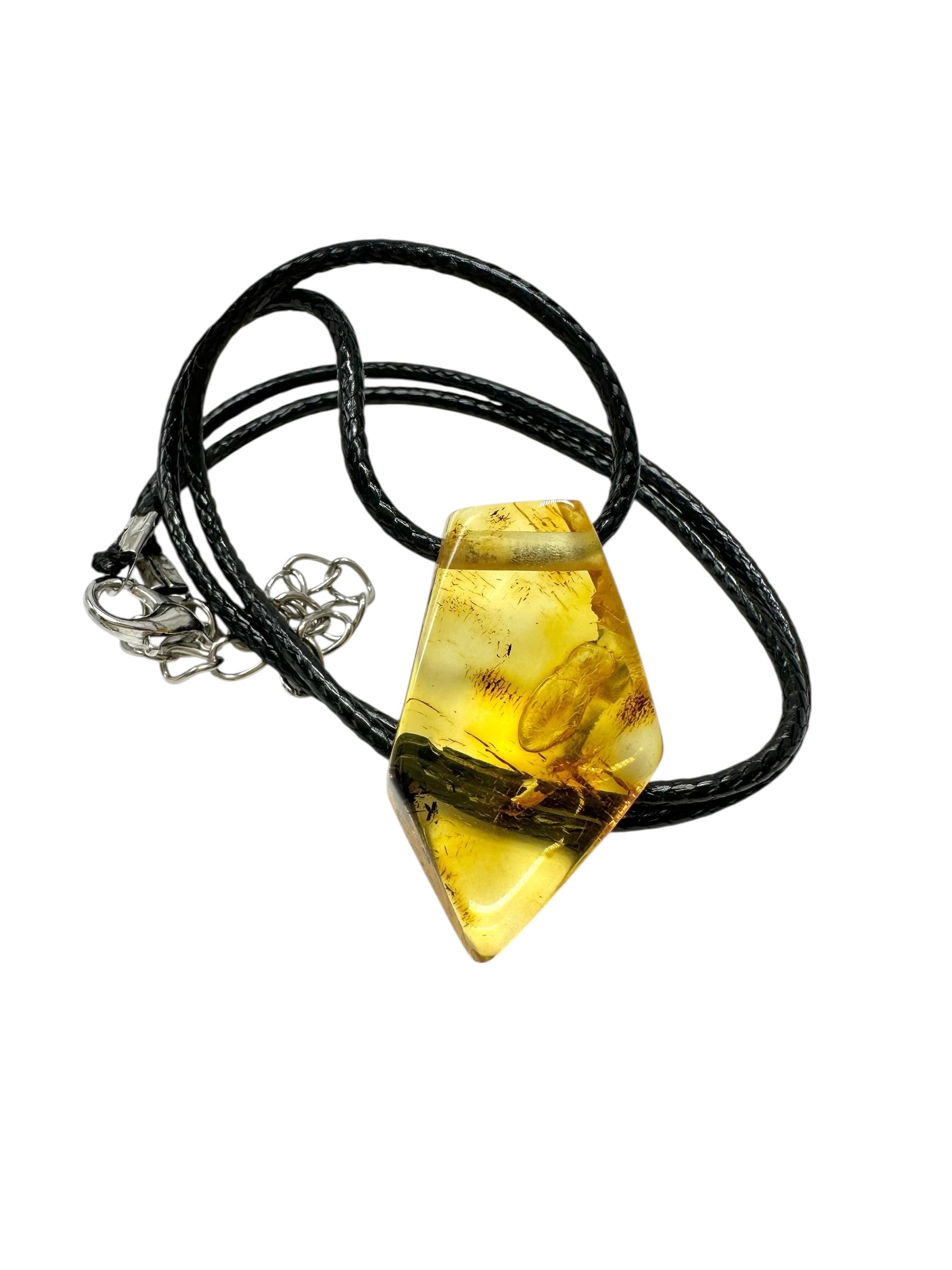 Amber pendant with leather cord