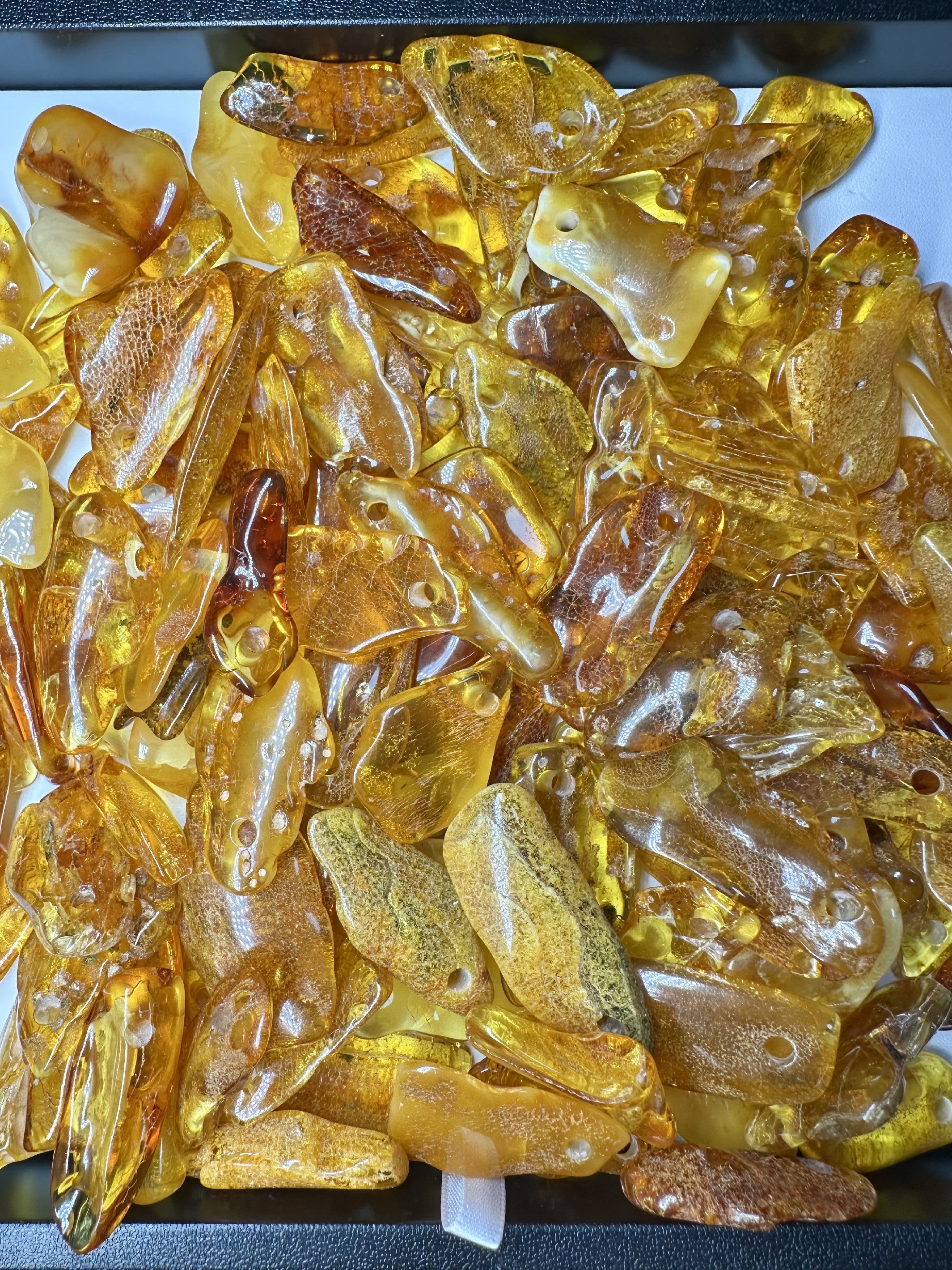 Amber with a drilled hole (polished) – Lithuania – 310g - JVEL01