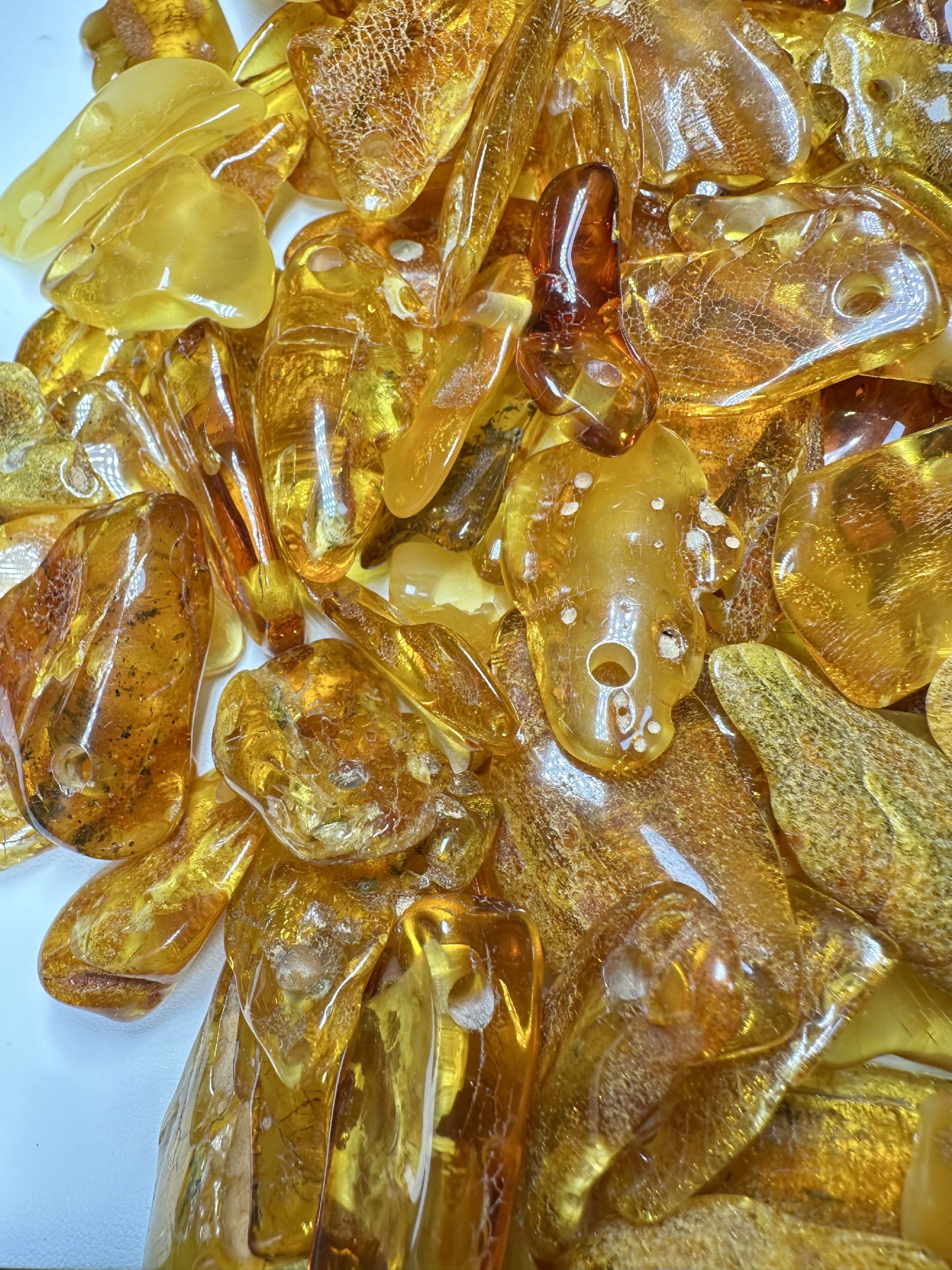 Amber with a drilled hole (polished) – Lithuania – 310g - JVEL01