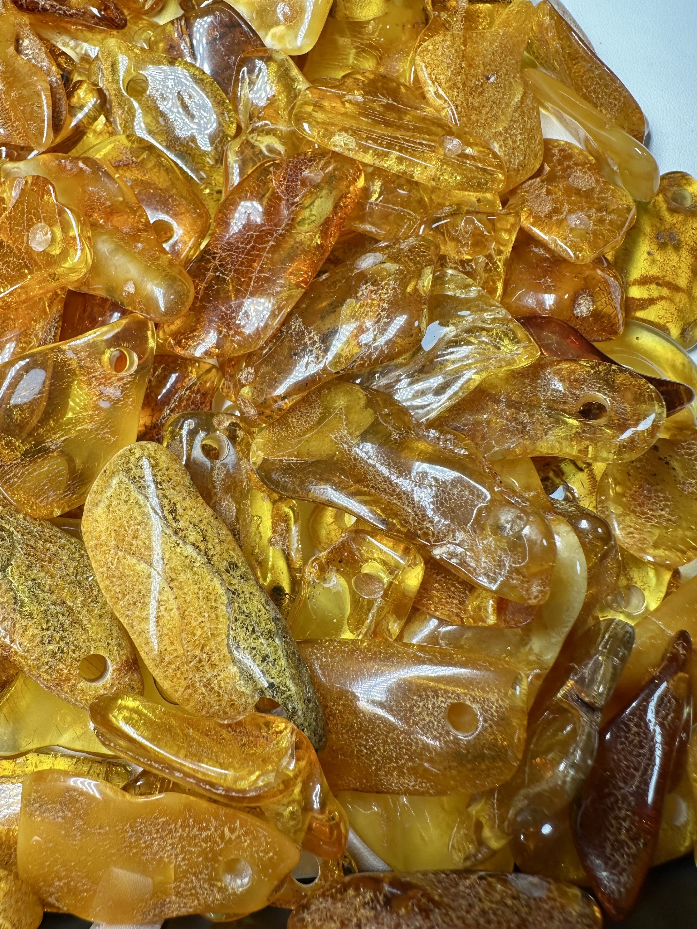 Amber with a drilled hole (polished) – Lithuania – 310g - JVEL01