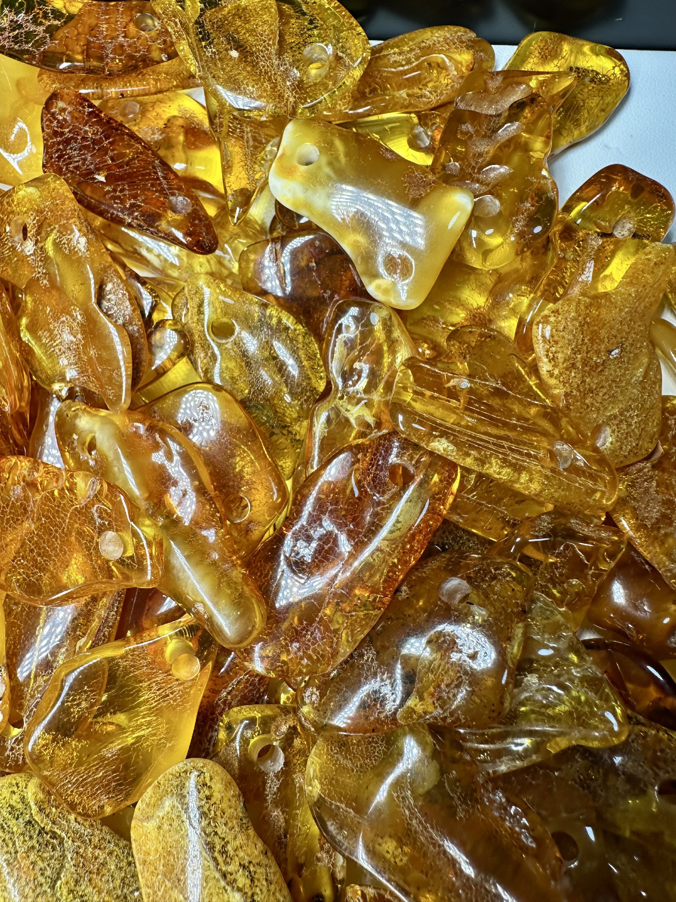 Amber with a drilled hole (polished) – Lithuania – 310g - JVEL01