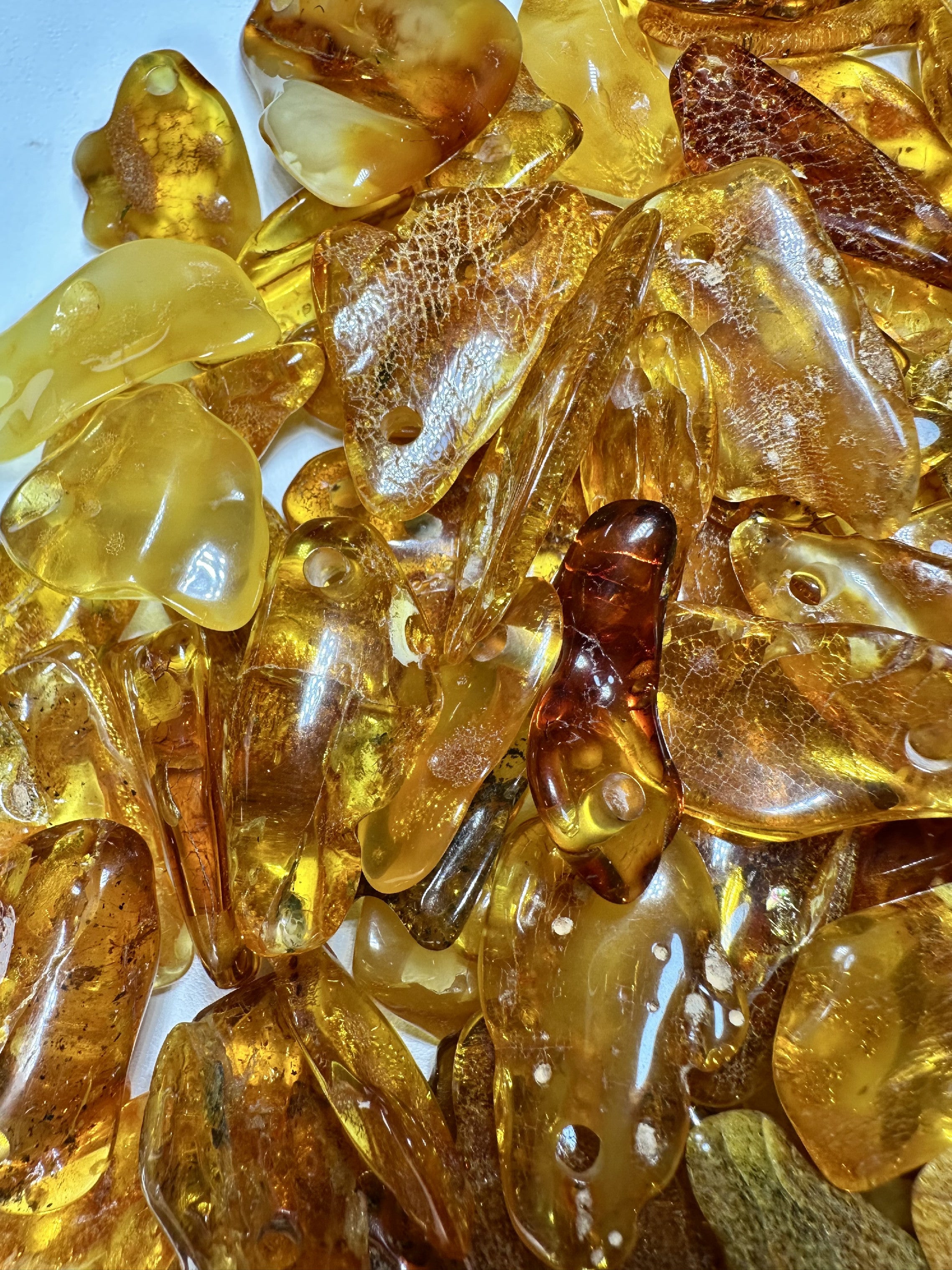 Amber with a drilled hole (polished) – Lithuania – 310g - JVEL01