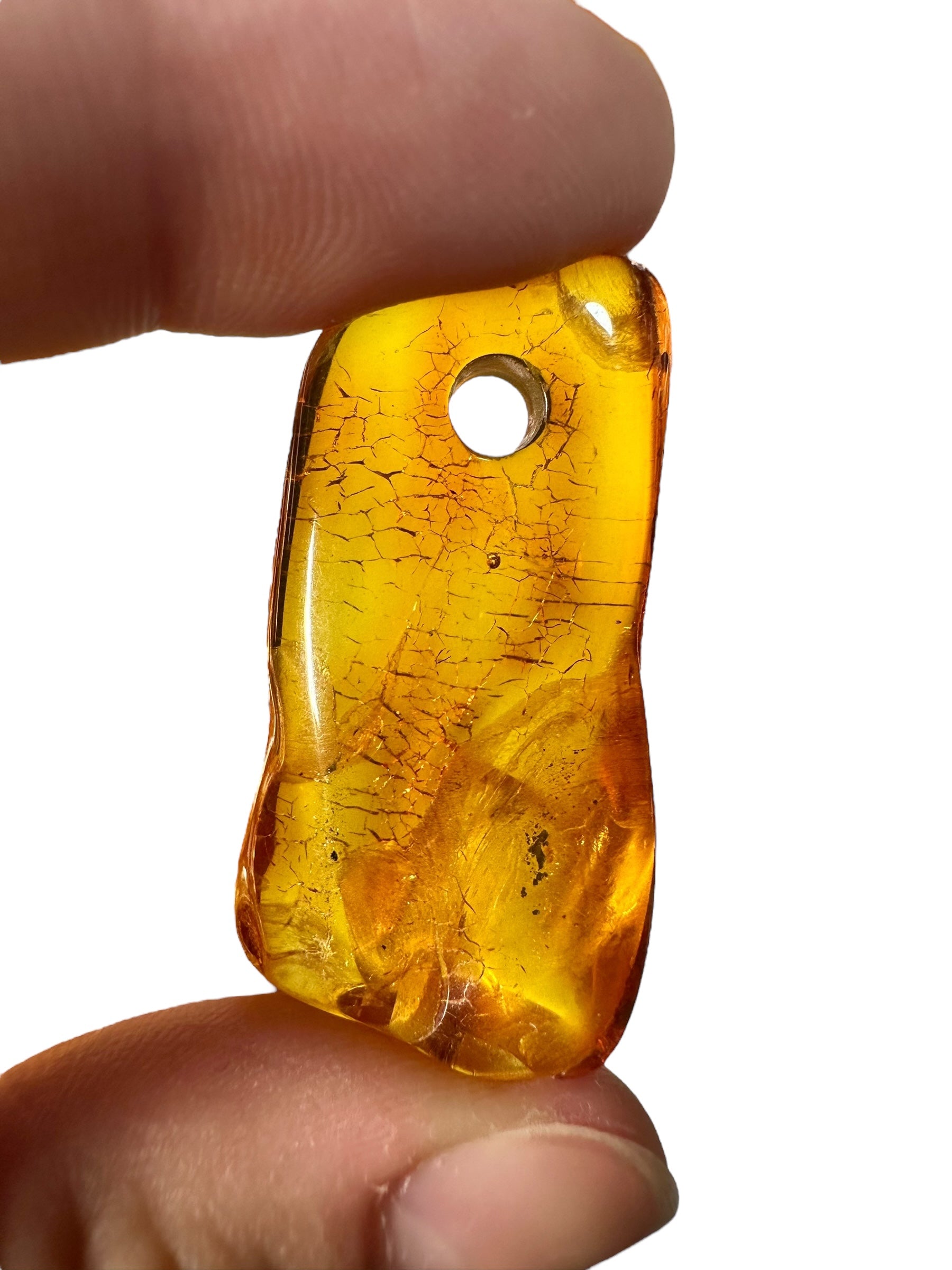 Amber with a drilled hole (polished) – Lithuania – 310g - JVEL01