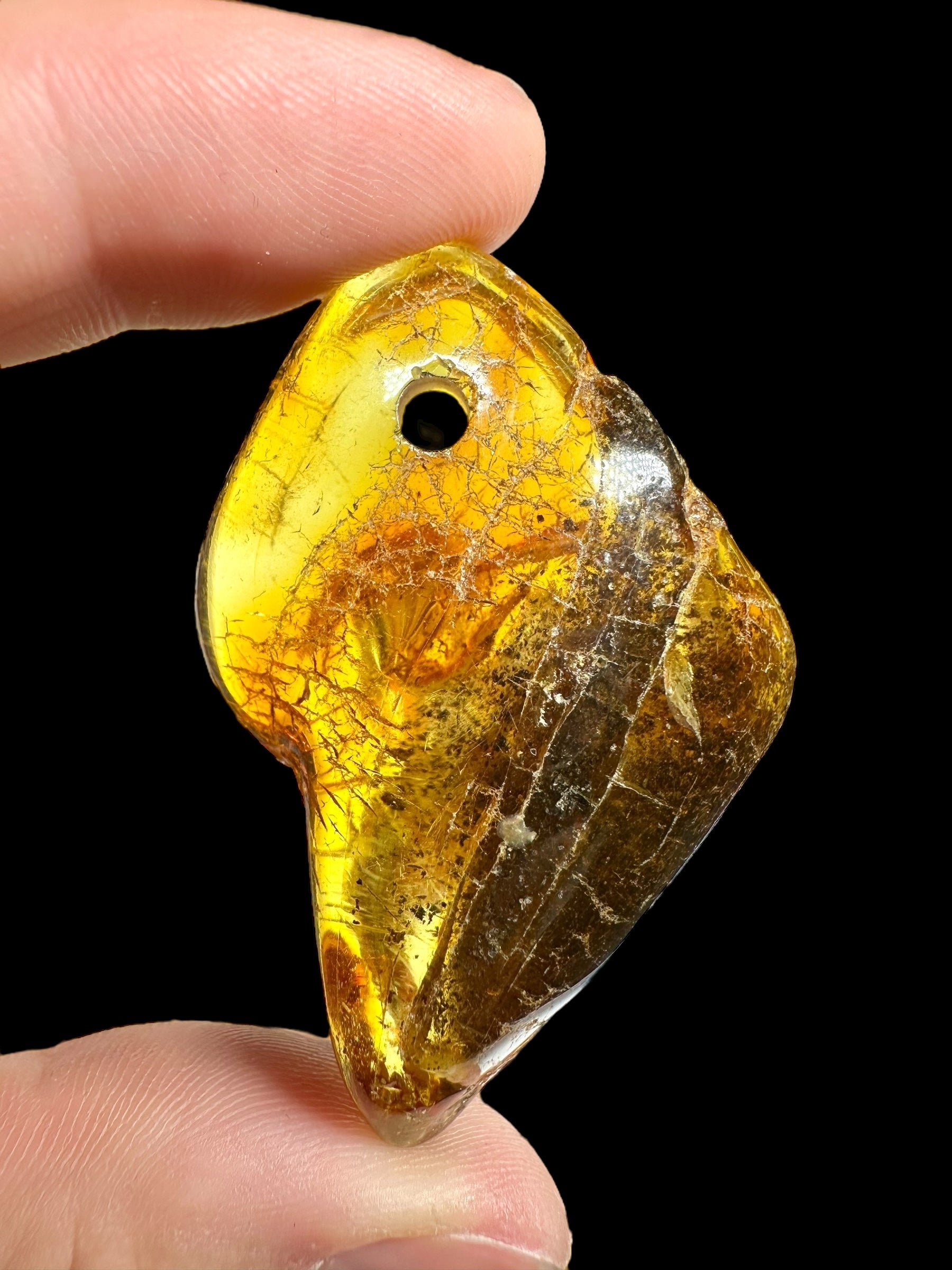 Amber with a drilled hole (polished) – Lithuania – 255g - JVEL03