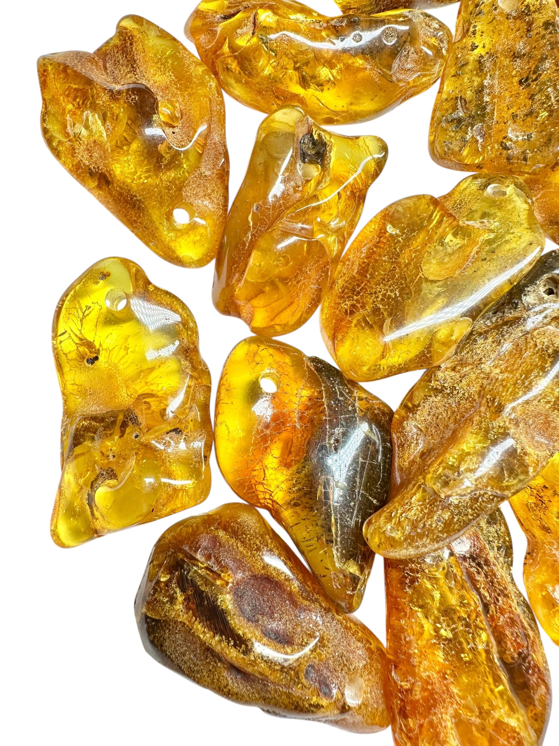 Amber with a drilled hole (polished) – Lithuania – 255g - JVEL03
