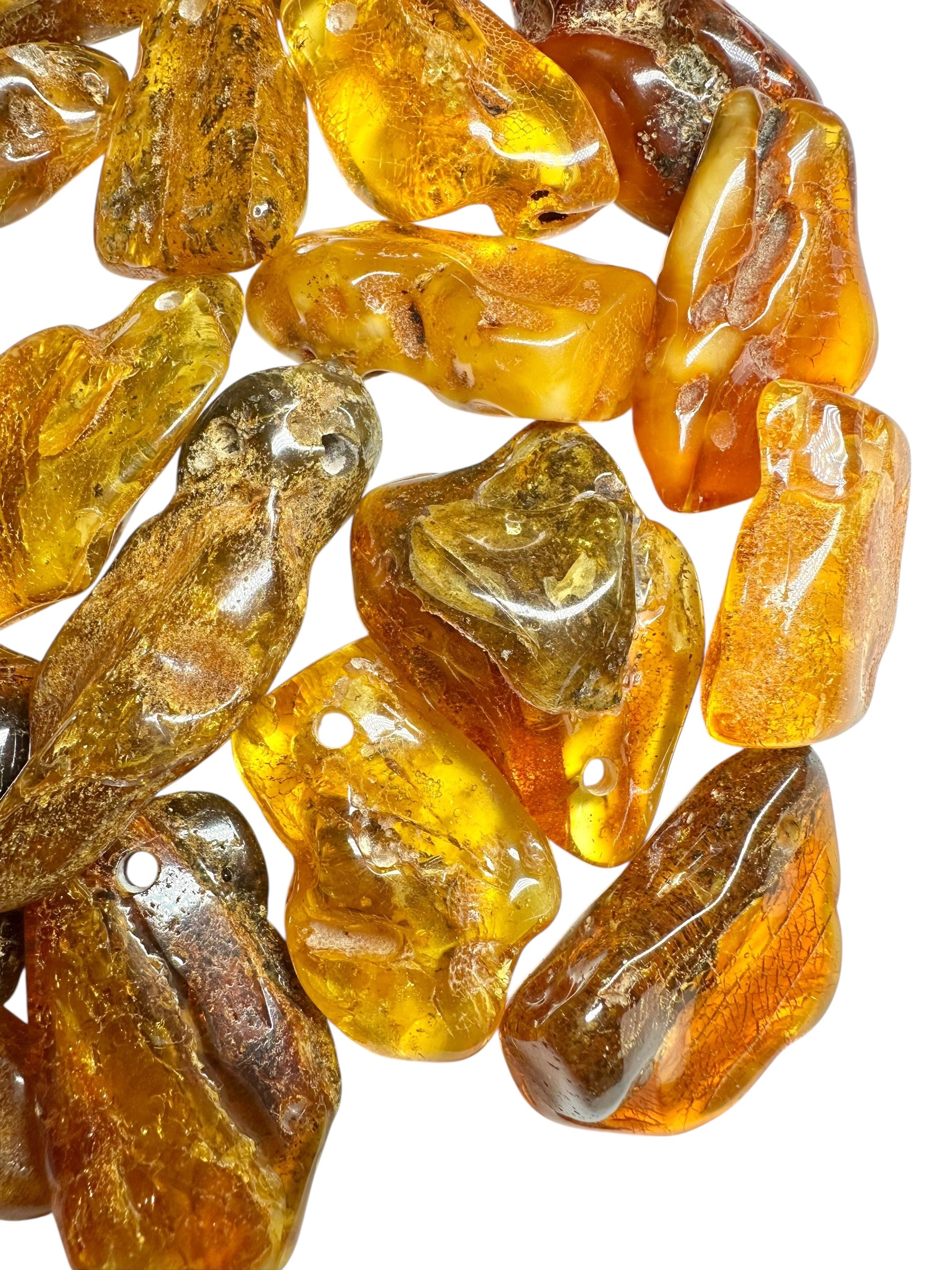 Amber with a drilled hole (polished) – Lithuania – 255g - JVEL03