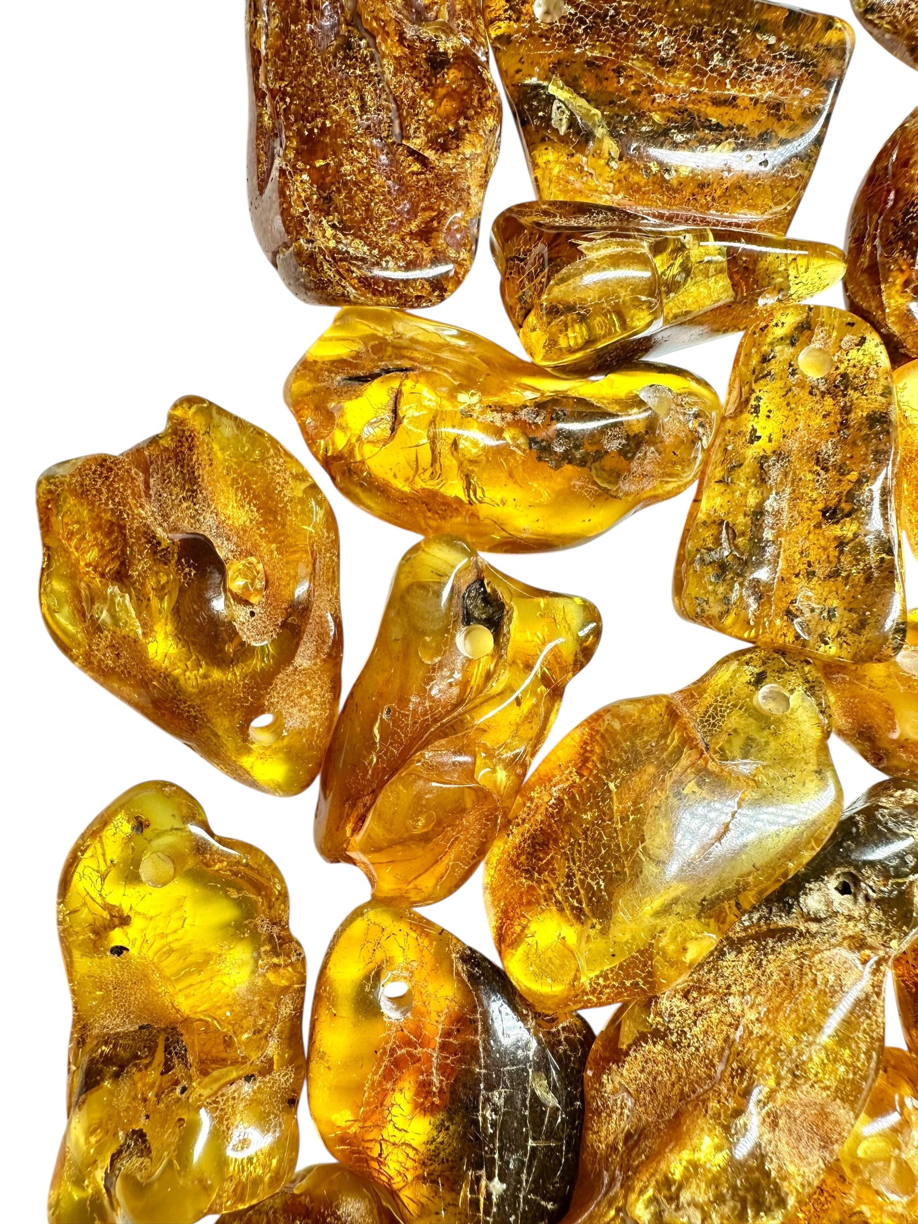 Amber with a drilled hole (polished) – Lithuania – 255g - JVEL03