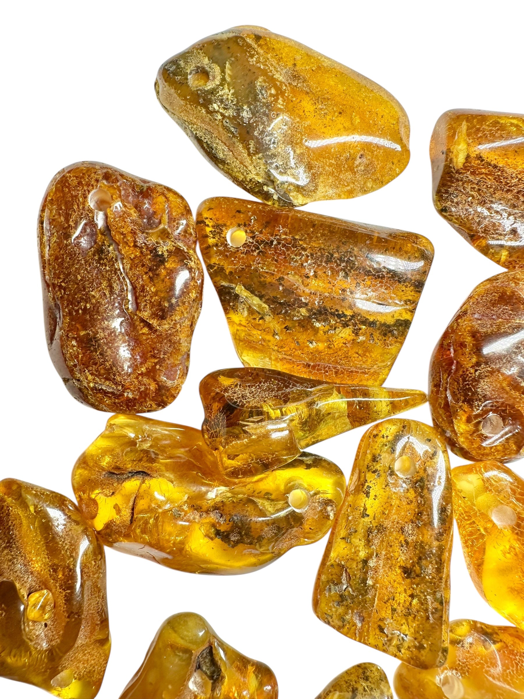 Amber with a drilled hole (polished) – Lithuania – 255g - JVEL03