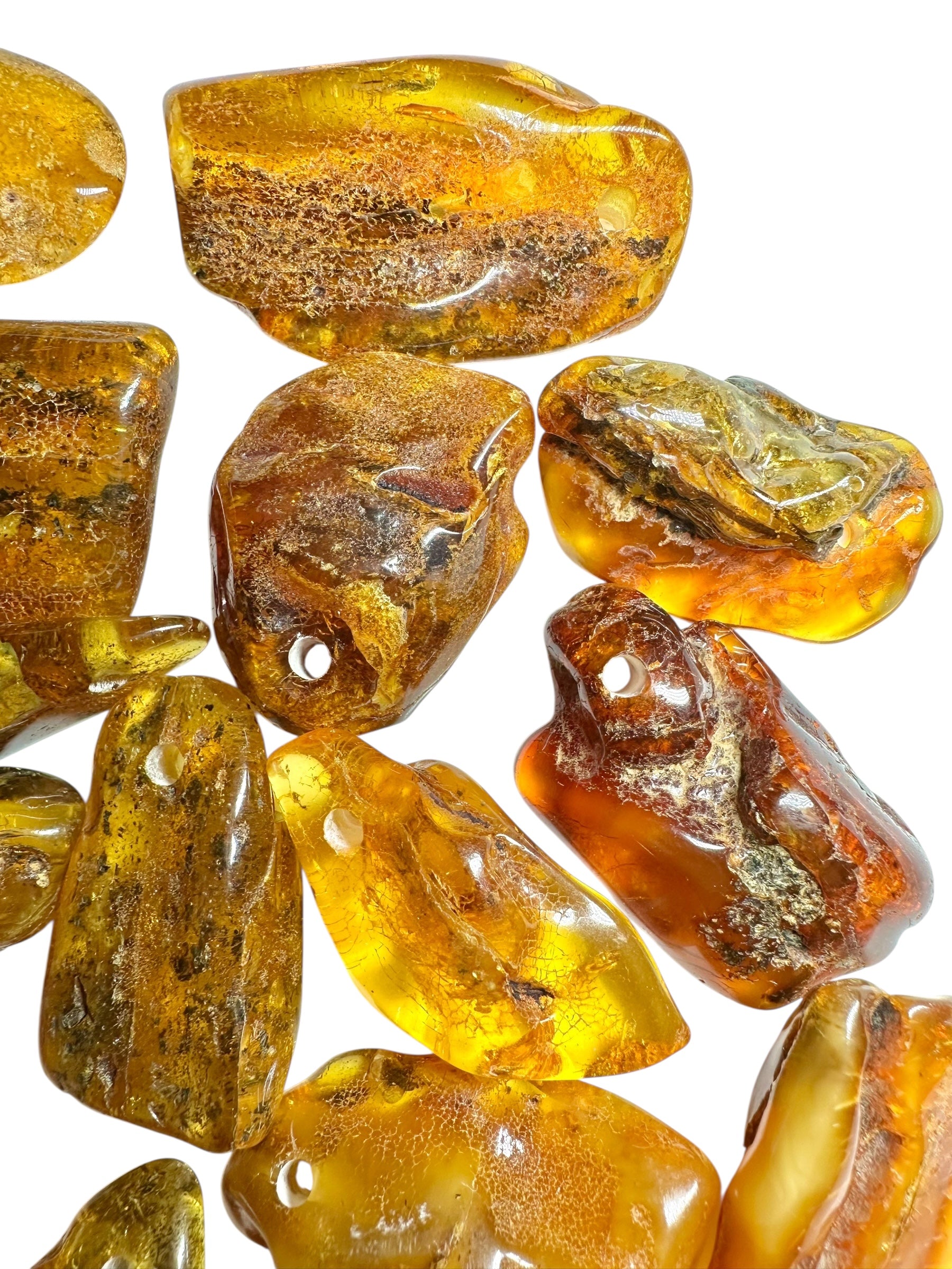 Amber with a drilled hole (polished) – Lithuania – 255g - JVEL03