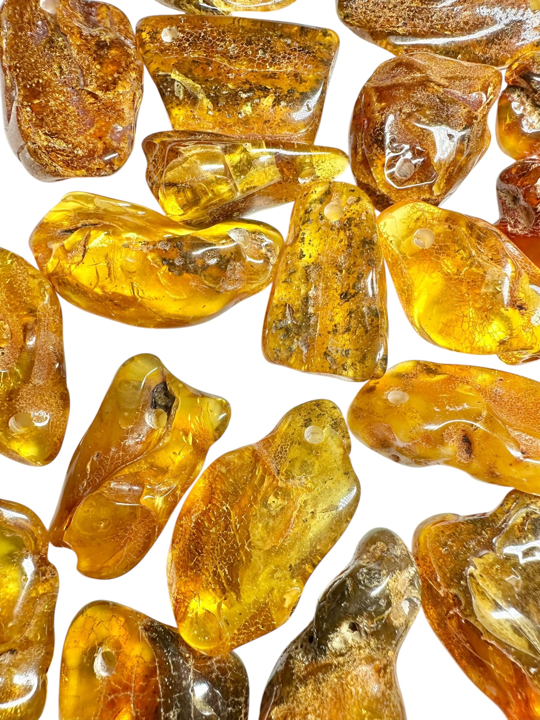 Amber with a drilled hole (polished) – Lithuania – 255g - JVEL03