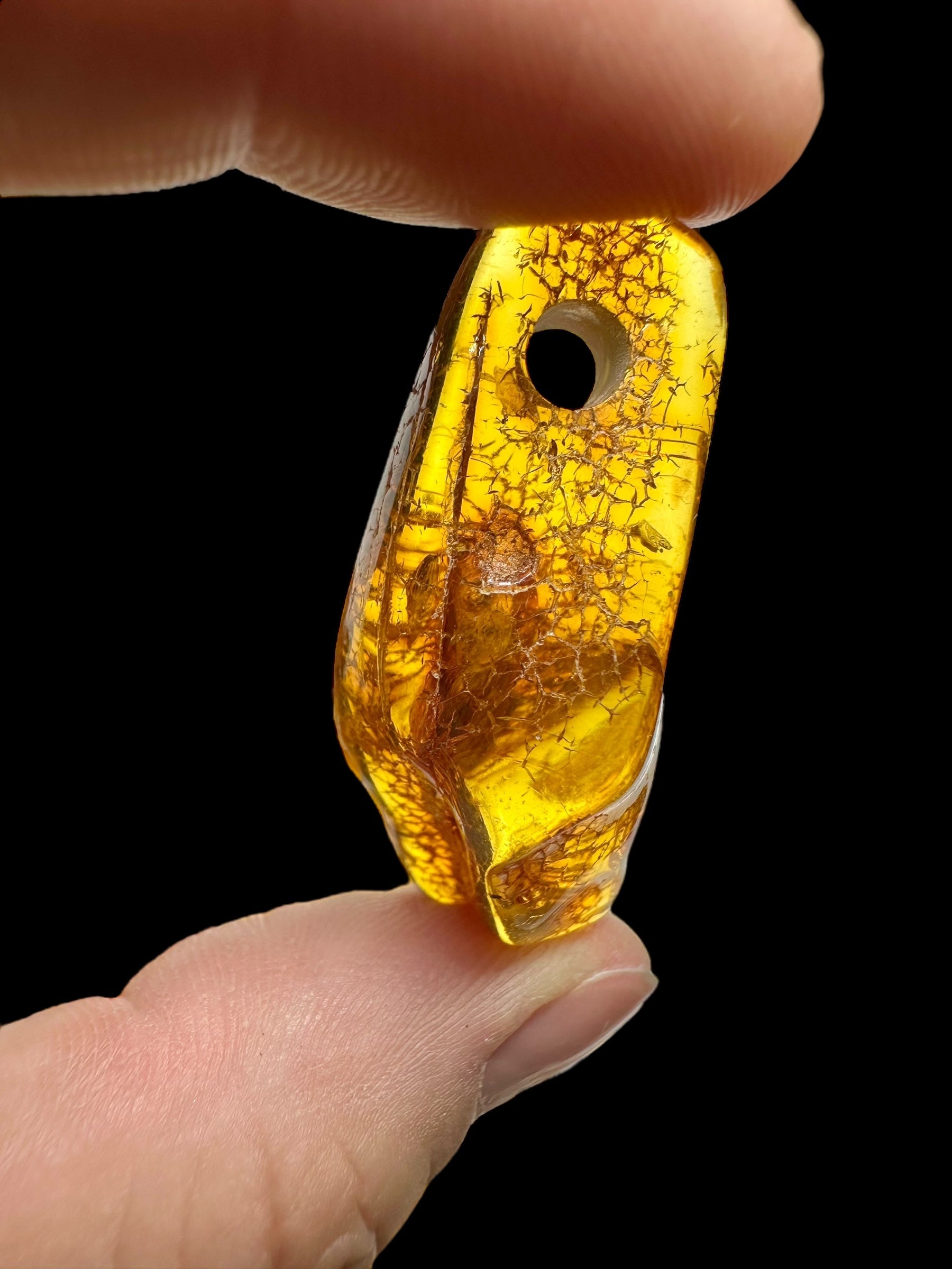 Amber with a drilled hole (polished) – Lithuania – 165g - JVEL04