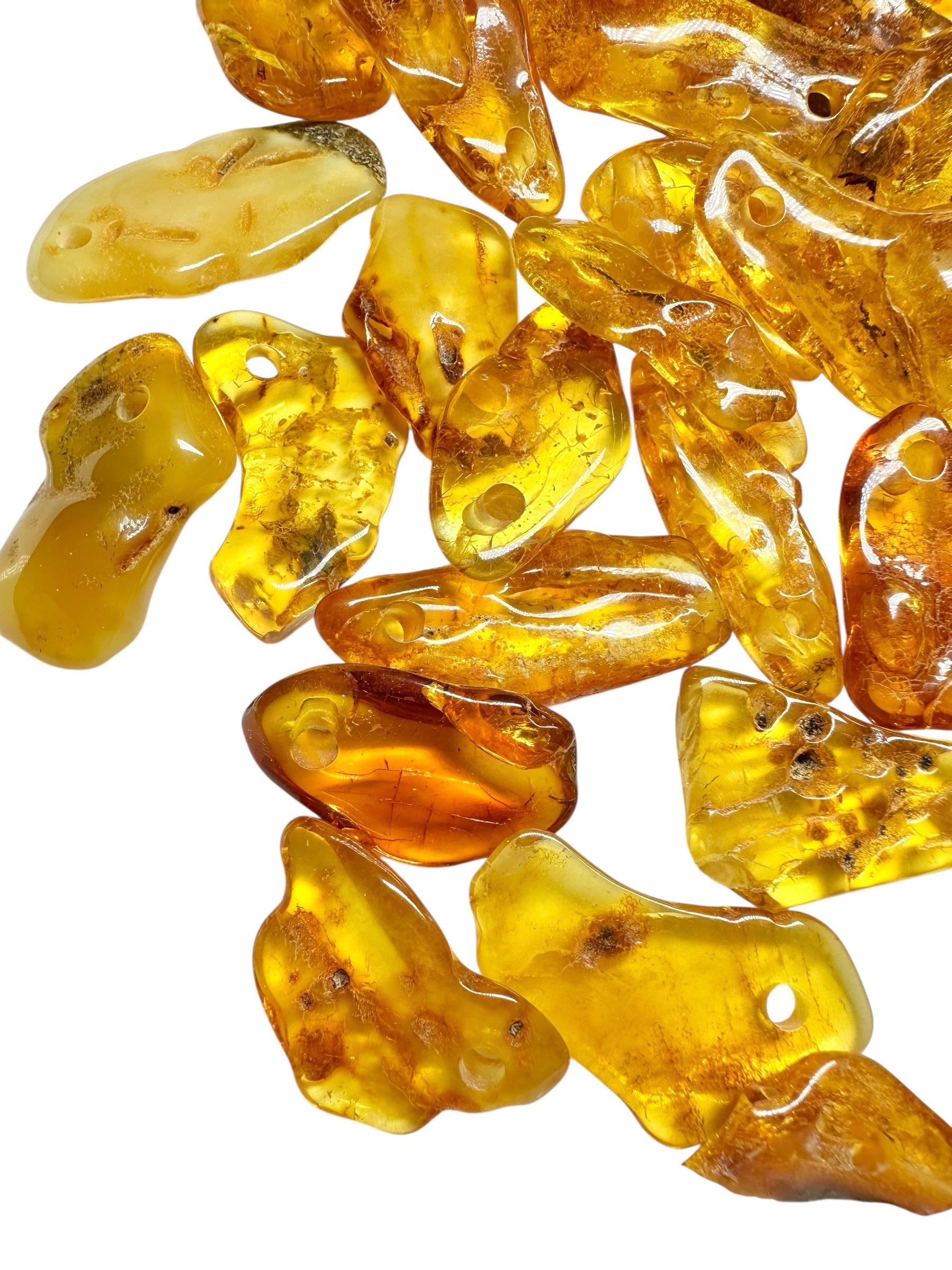 Amber with a drilled hole (polished) – Lithuania – 165g - JVEL04