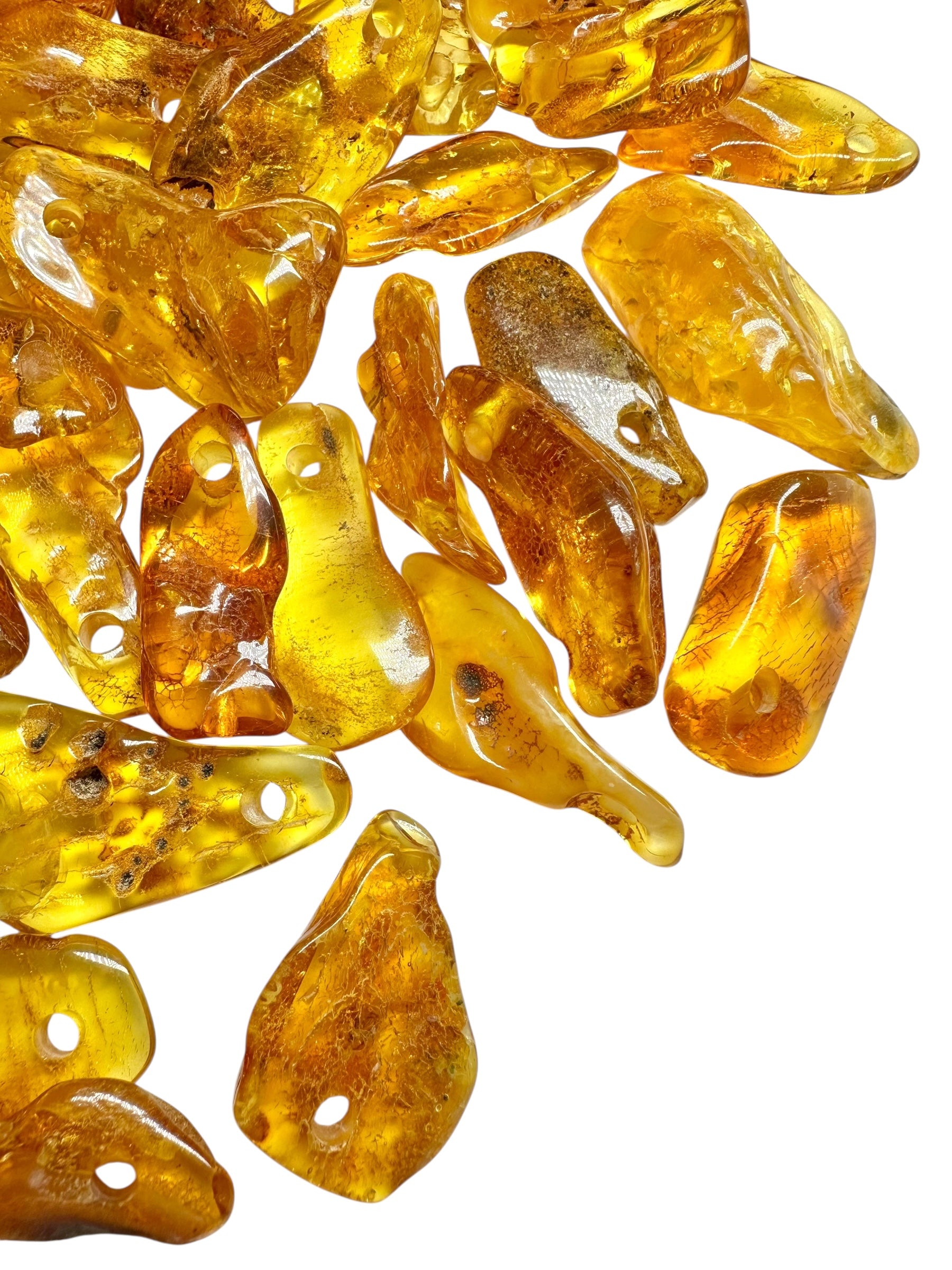 Amber with a drilled hole (polished) – Lithuania – 165g - JVEL04