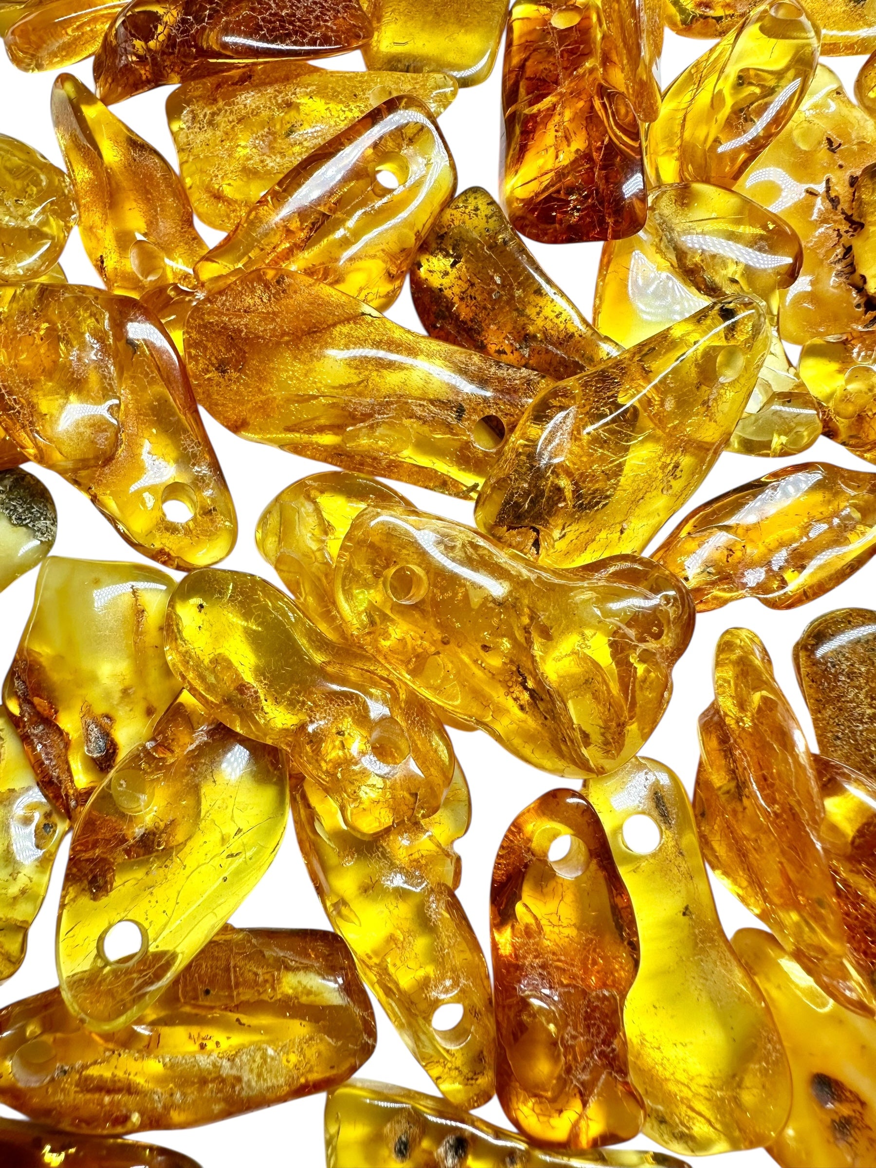 Amber with a drilled hole (polished) – Lithuania – 165g - JVEL04