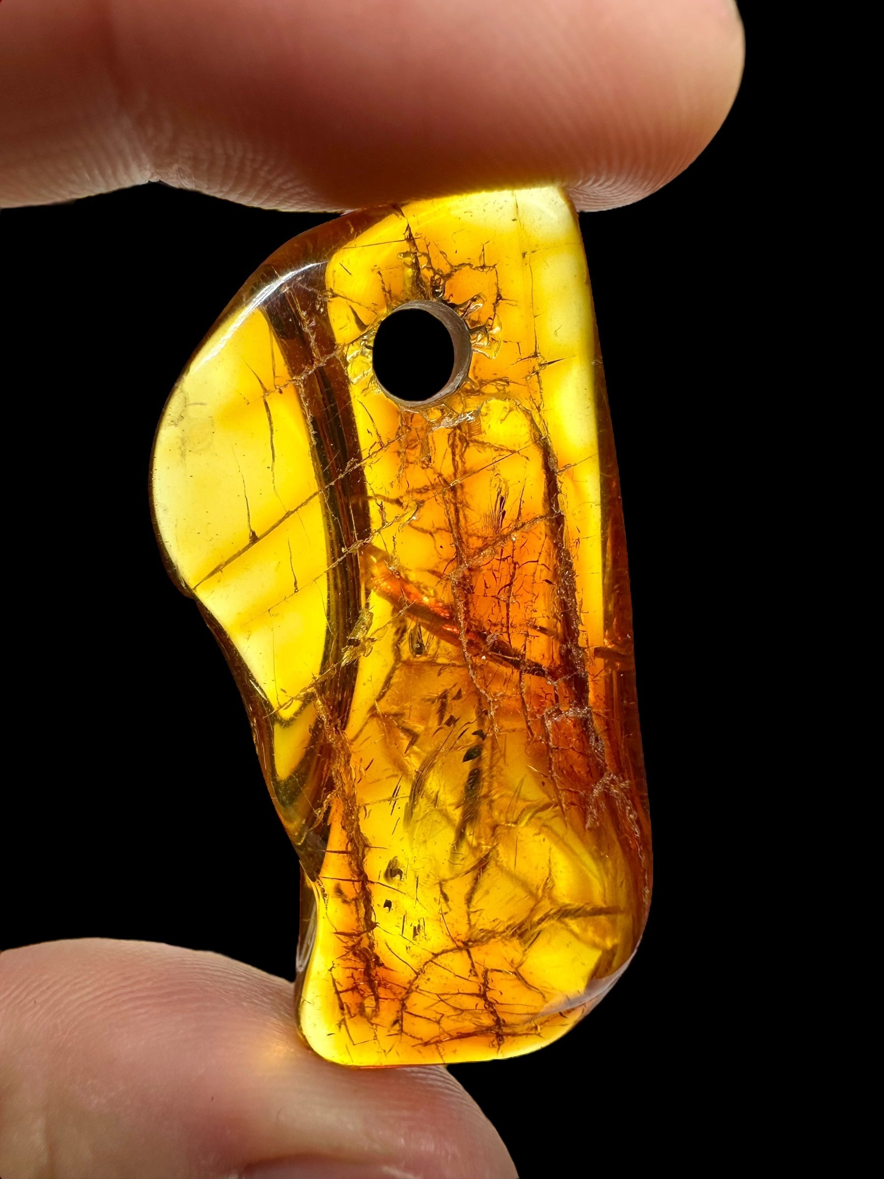 Amber with a drilled hole (polished) – Lithuania – 165g - JVEL04