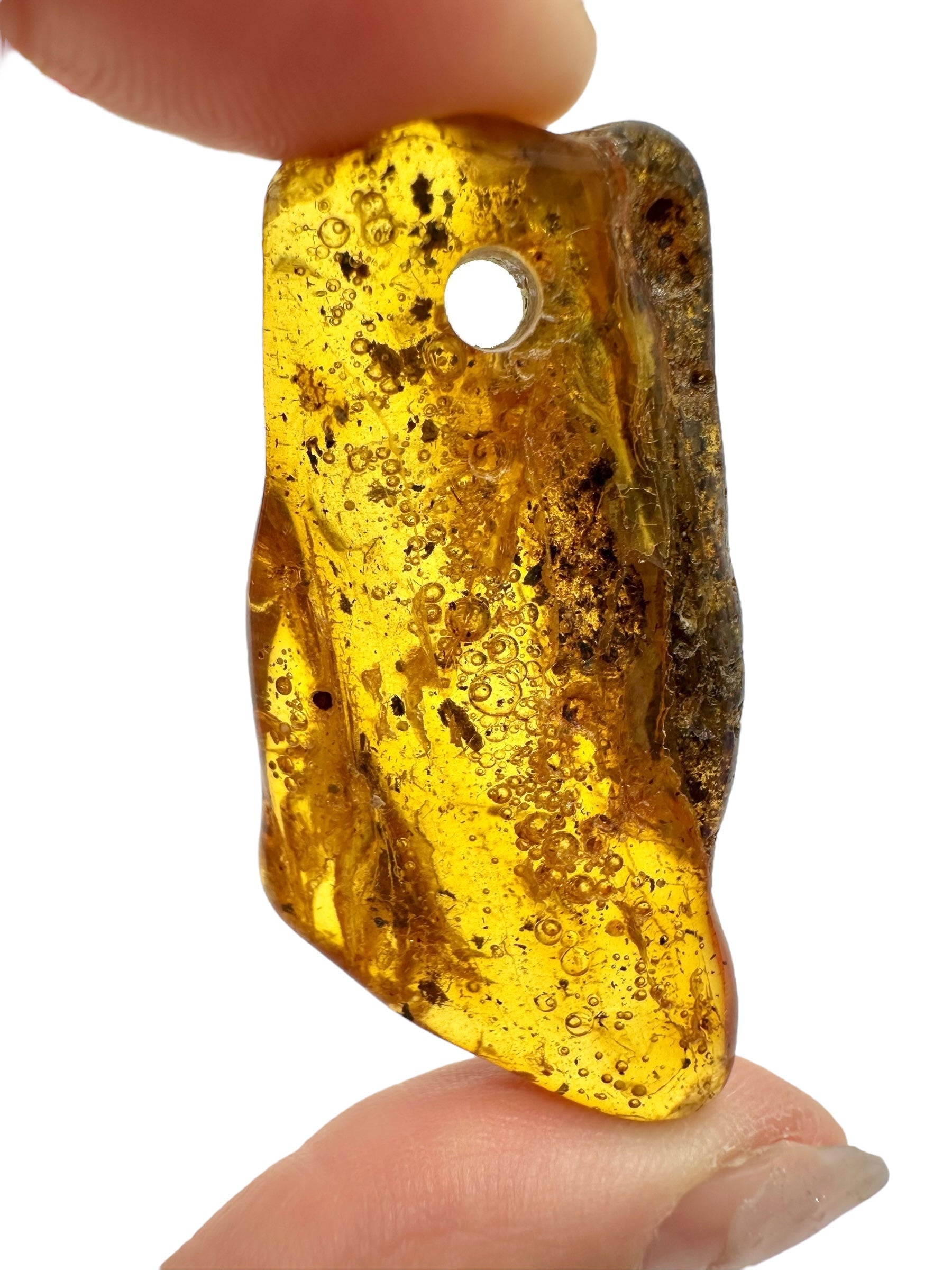 Amber with a drilled hole for hanging 7,8g – Lithuania - JND33