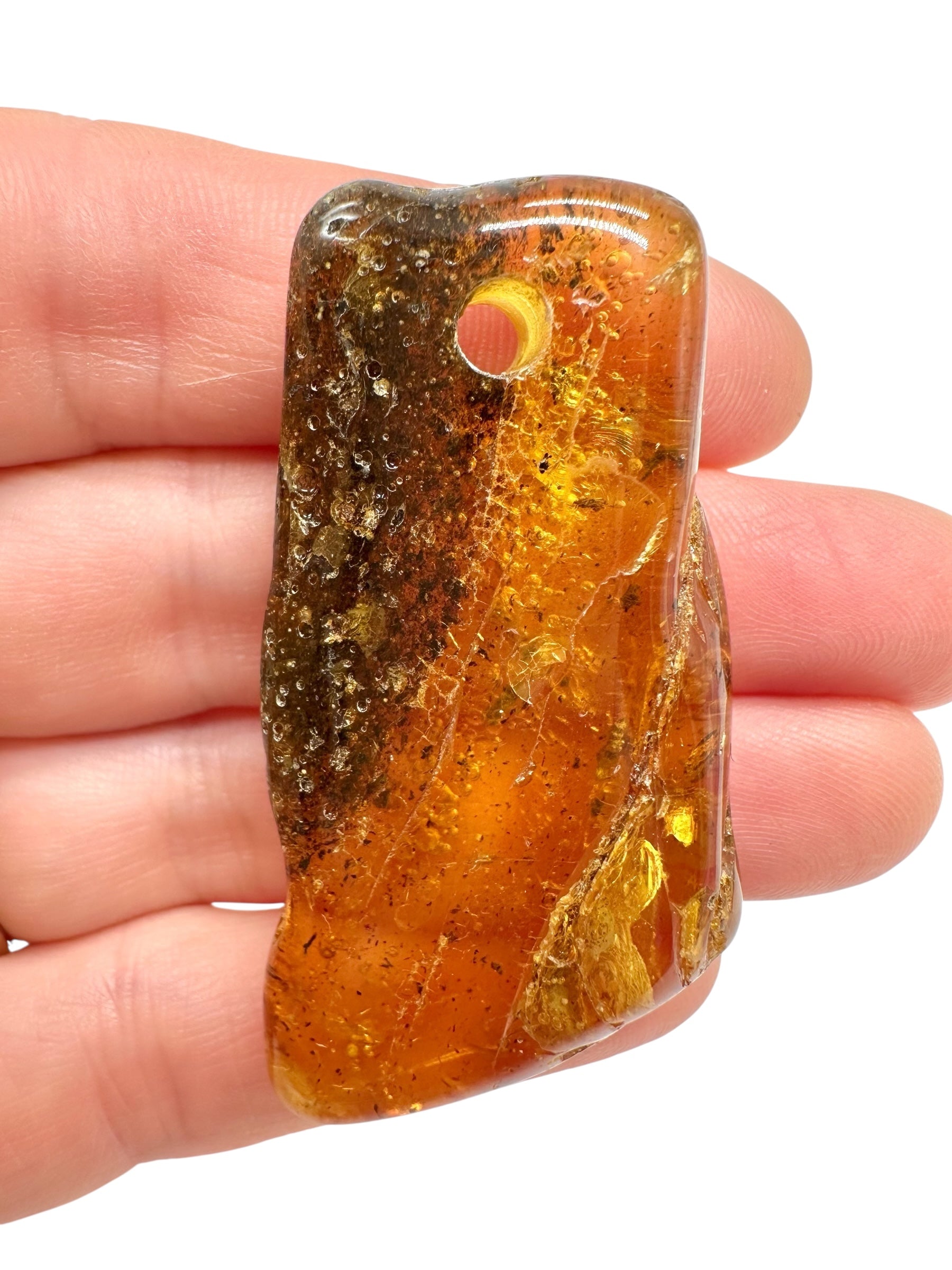 Amber with a drilled hole for hanging 7,8g – Lithuania