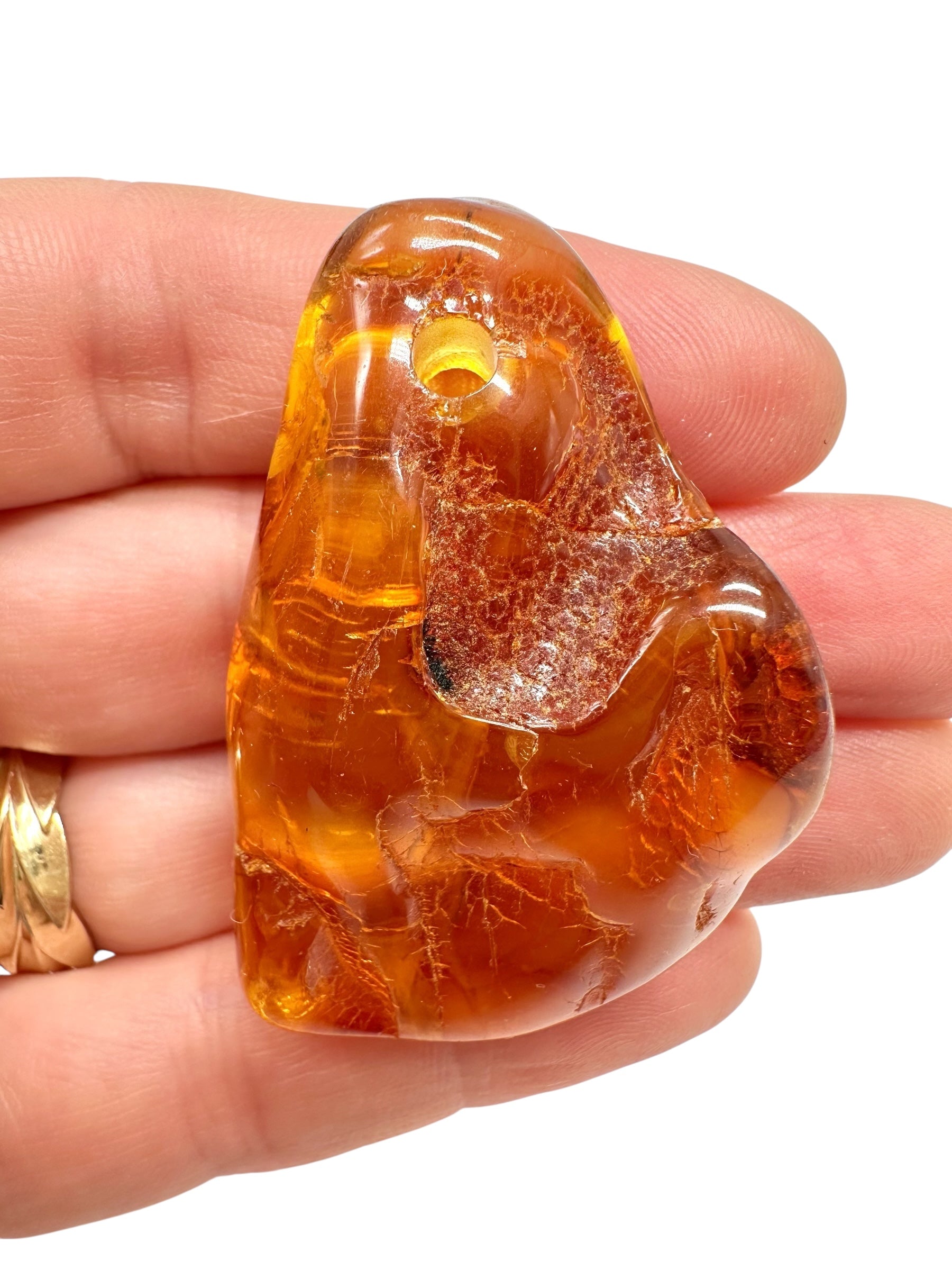 Amber with a drilled hole for hanging 10,1g – Lithuania