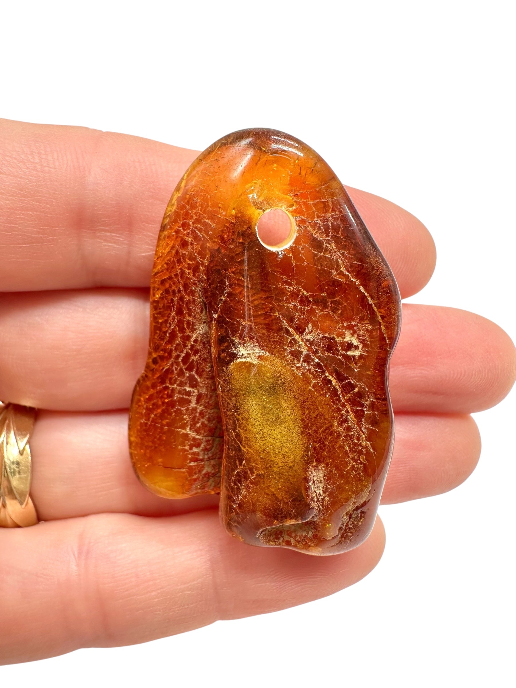 Amber with a drilled hole for hanging 9,8g – Lithuania