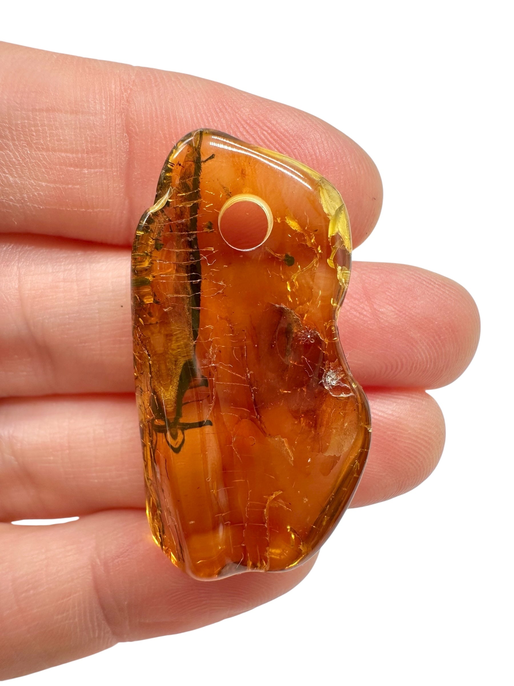 Amber with a drilled hole for hanging 3g – Lithuania - JND38