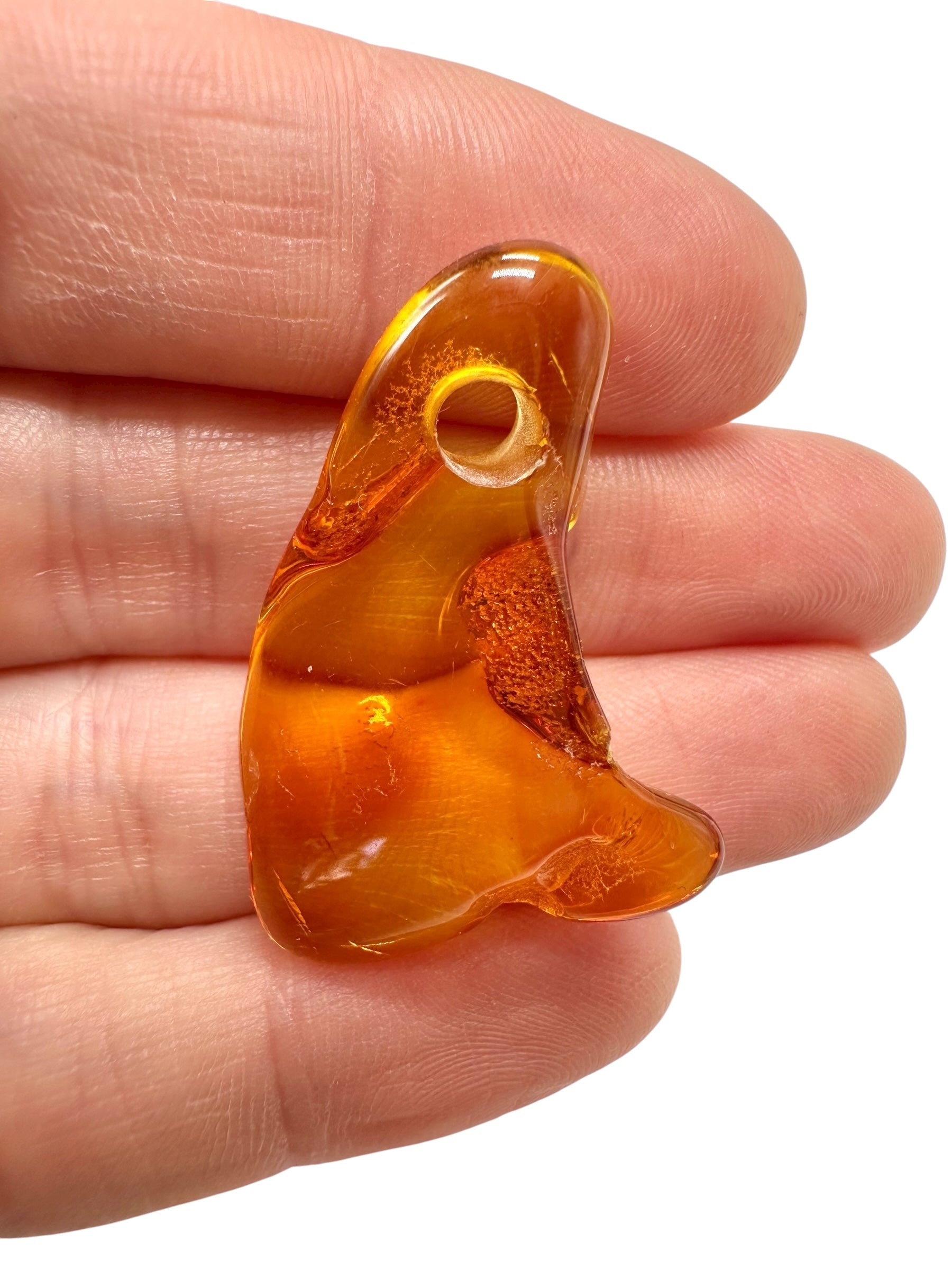 Amber with a drilled hole for hanging 2,1g – Lithuania - JND39