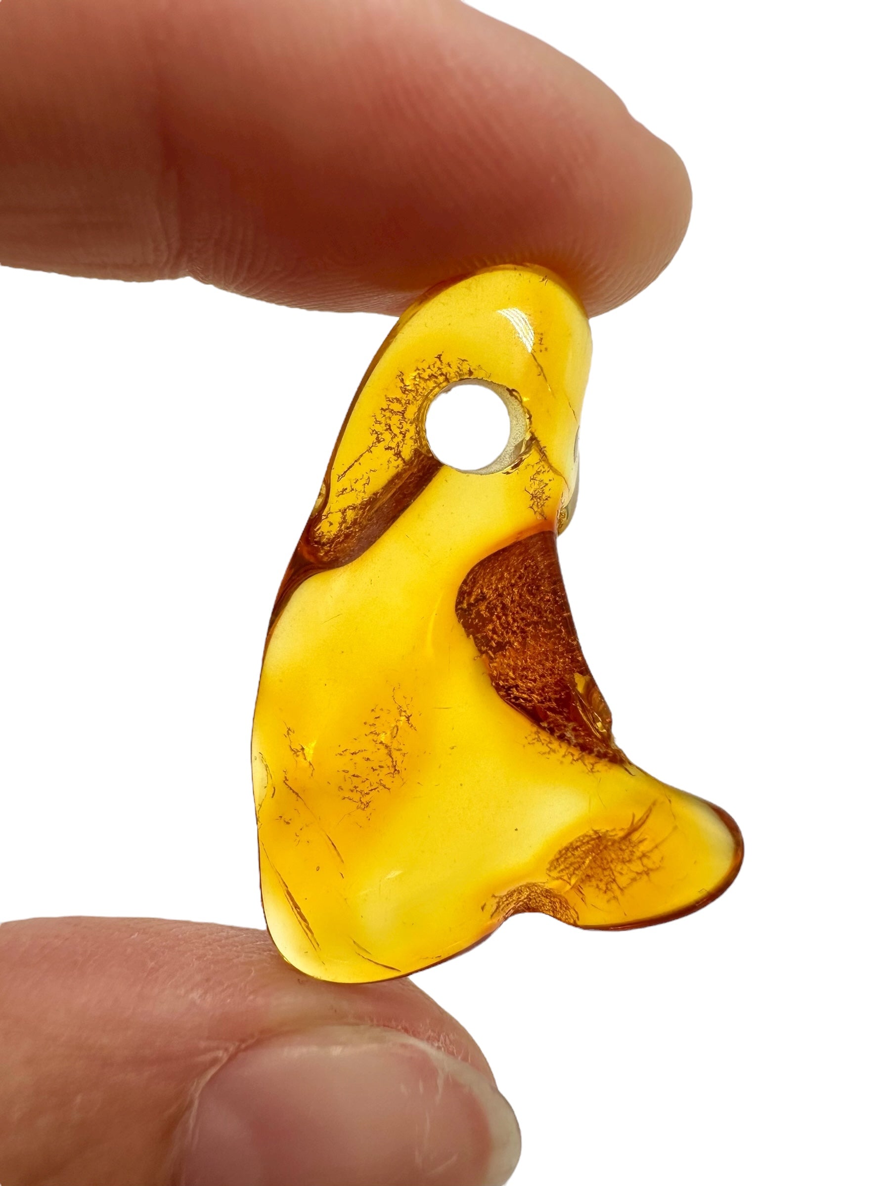 Amber with a drilled hole for hanging 2,1g – Lithuania - JND39