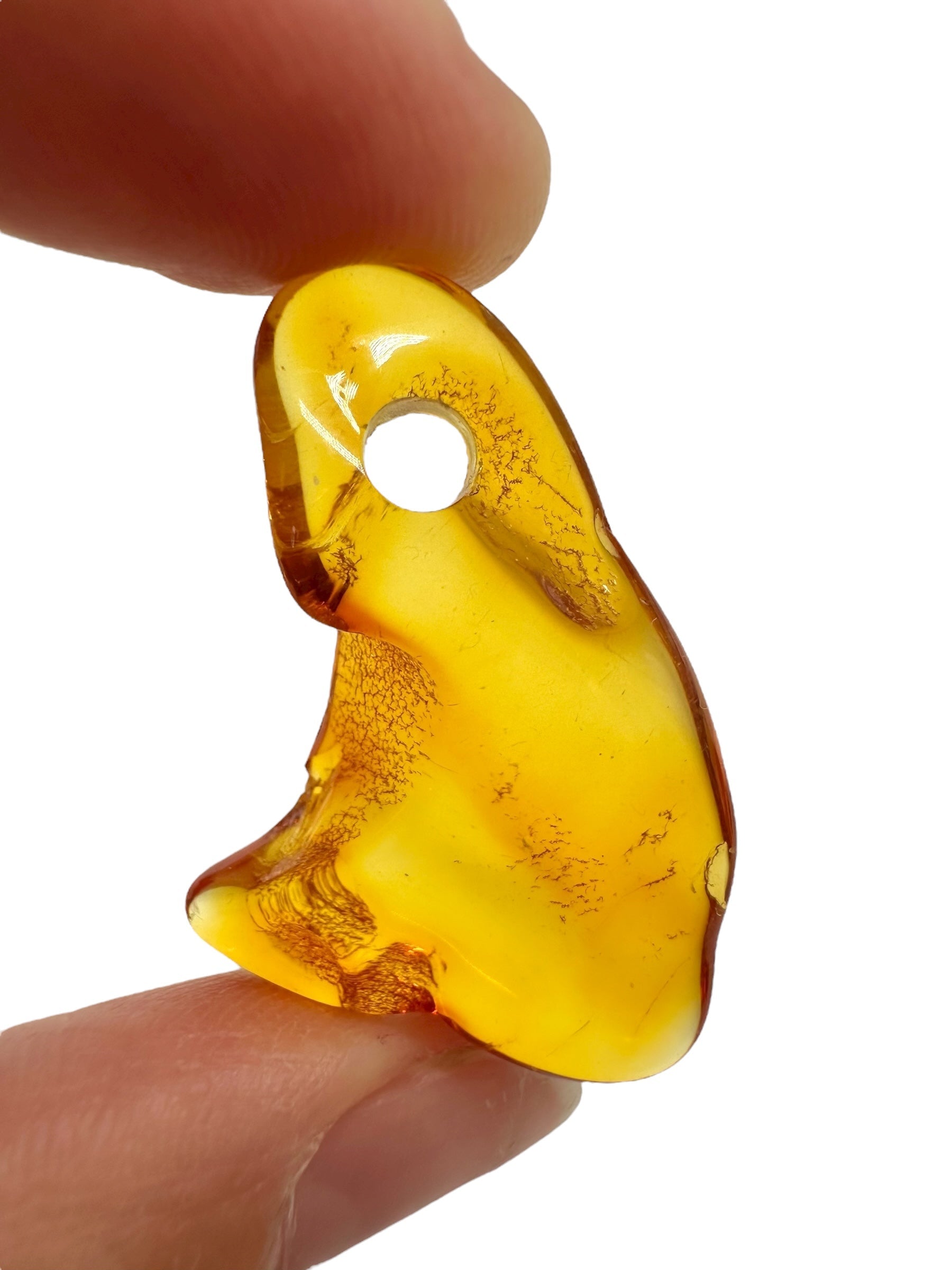 Amber with a drilled hole for hanging 2,1g – Lithuania - JND39