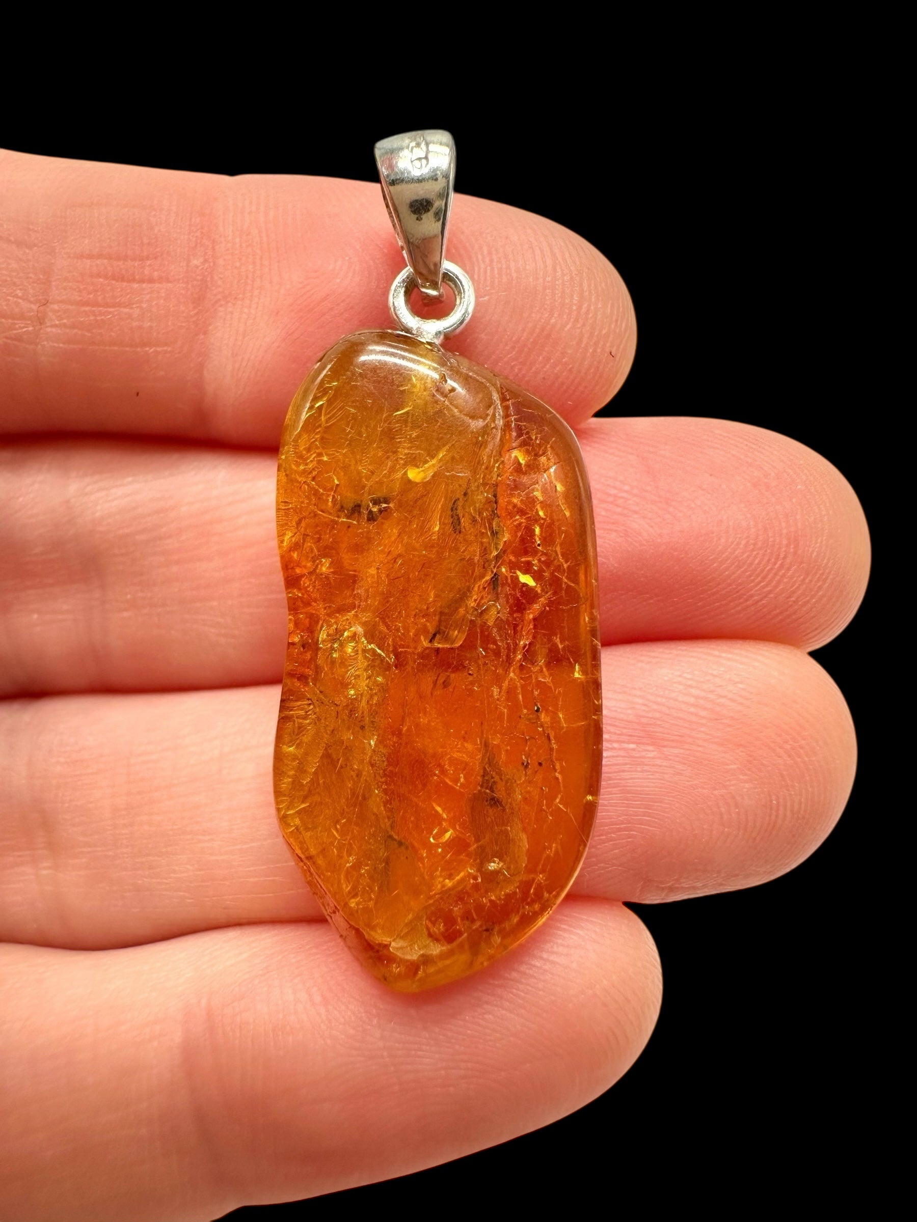 Silver amber pendant