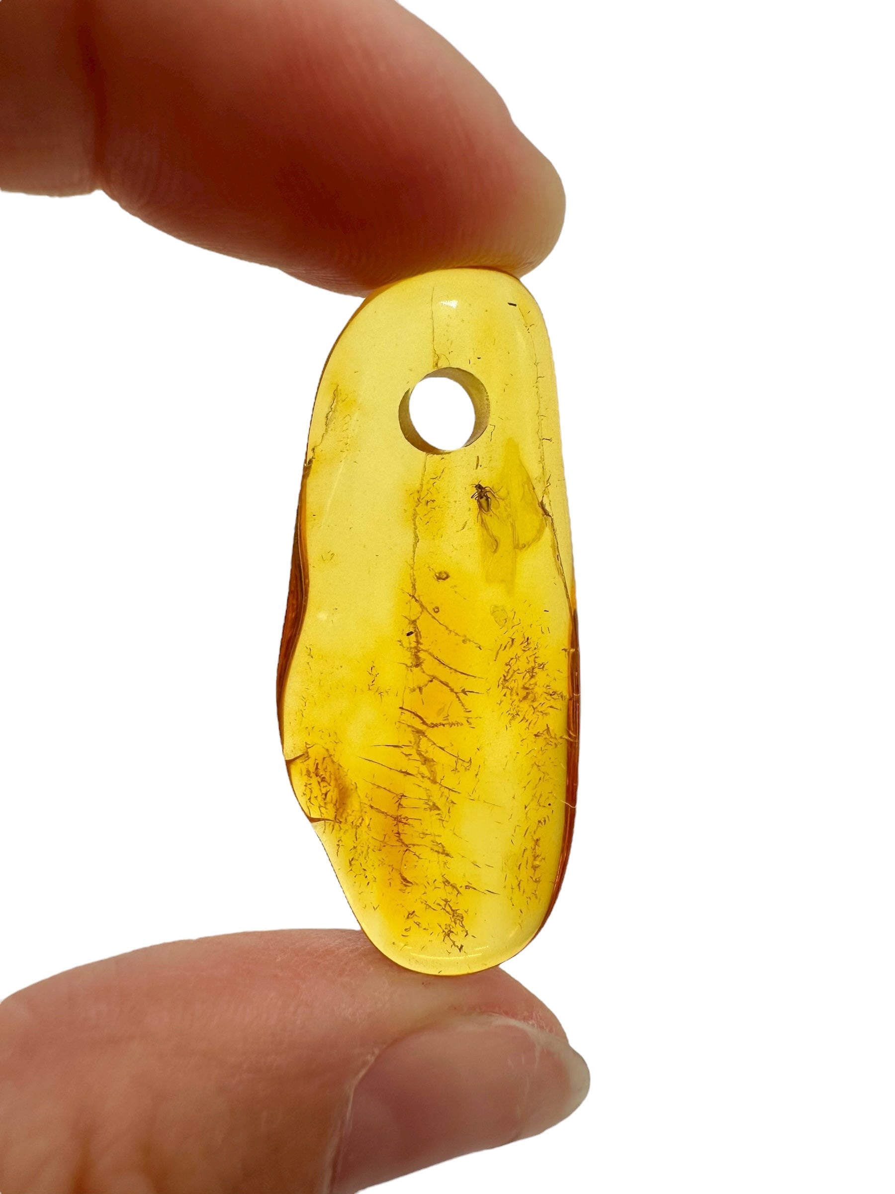 Amber with a drilled hole for hanging 1,7g – Lithuania - JND41