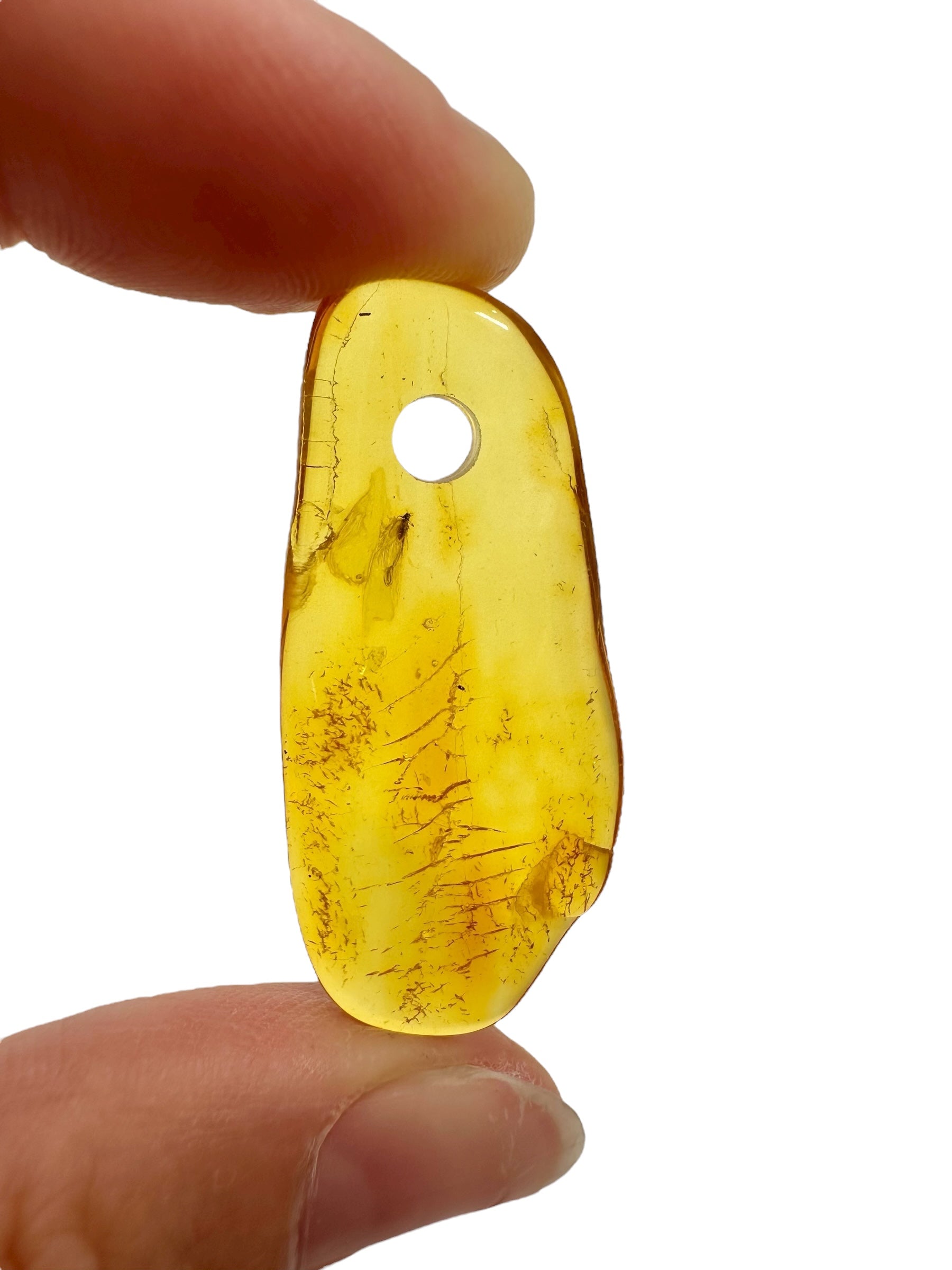 Amber with a drilled hole for hanging 1,7g – Lithuania - JND41