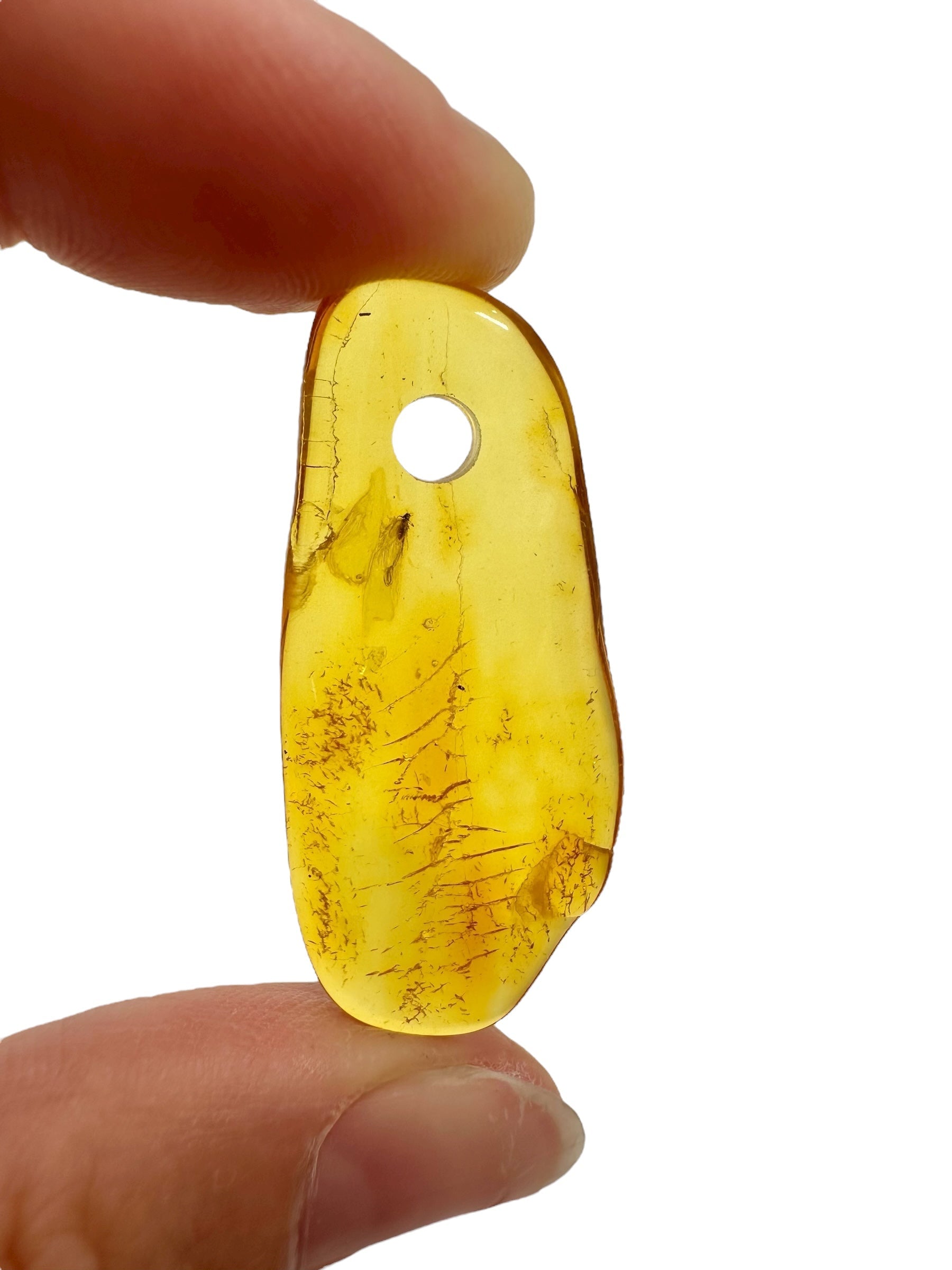 Amber with a drilled hole for hanging 1,7g – Lithuania - JND41