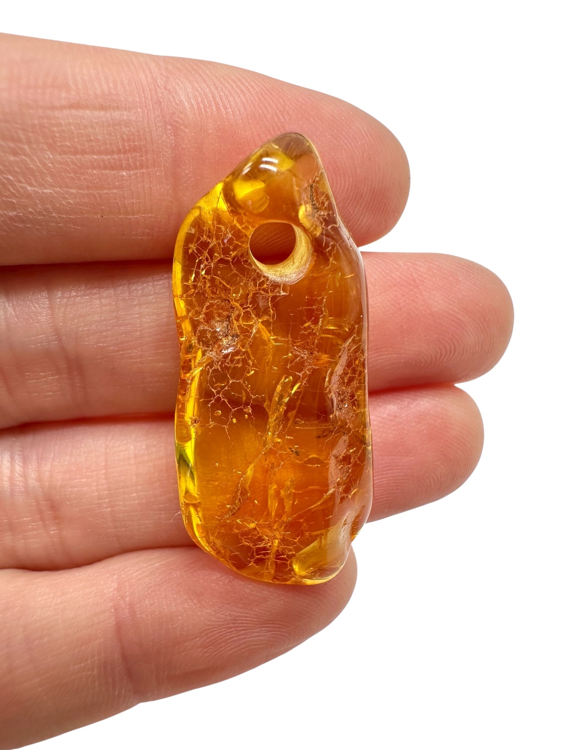 Amber with a drilled hole for hanging 2,8g – Lithuania - JND42