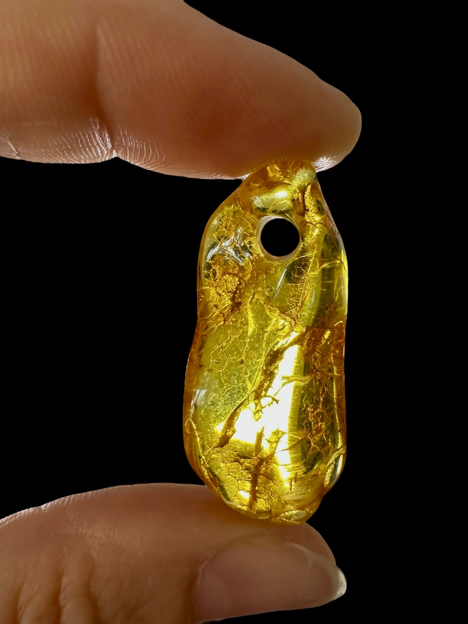 Amber with a drilled hole for hanging 2,8g – Lithuania - JND42