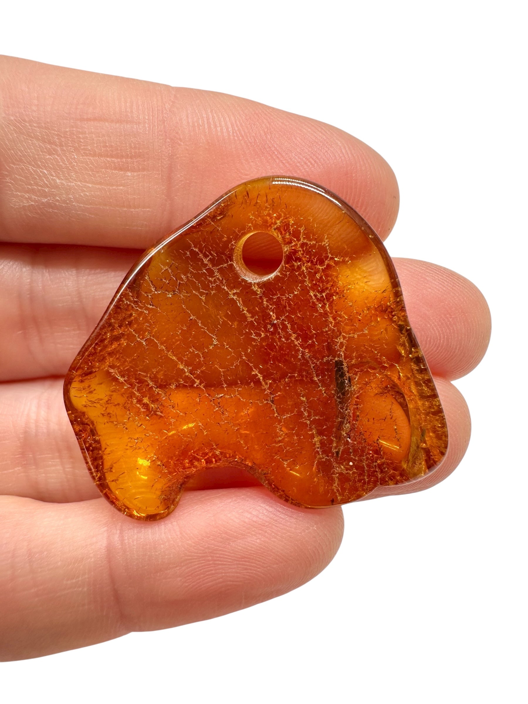 Amber with a drilled hole for hanging 3,4g – Lithuania - JND43