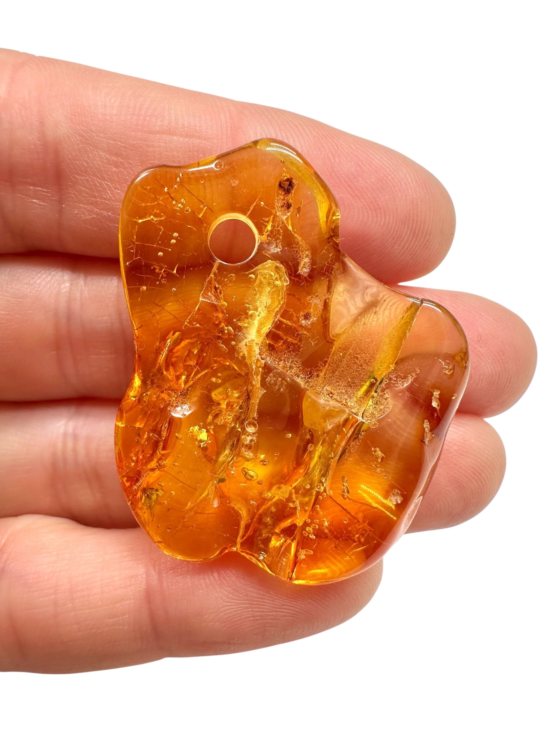 Amber with a drilled hole for hanging 4,4g – Lithuania - JND44