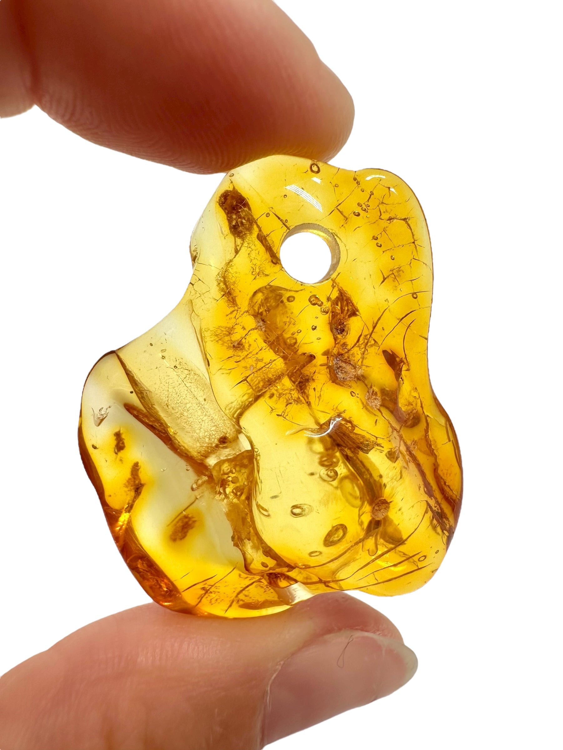 Amber with a drilled hole for hanging 4,4g – Lithuania - JND44