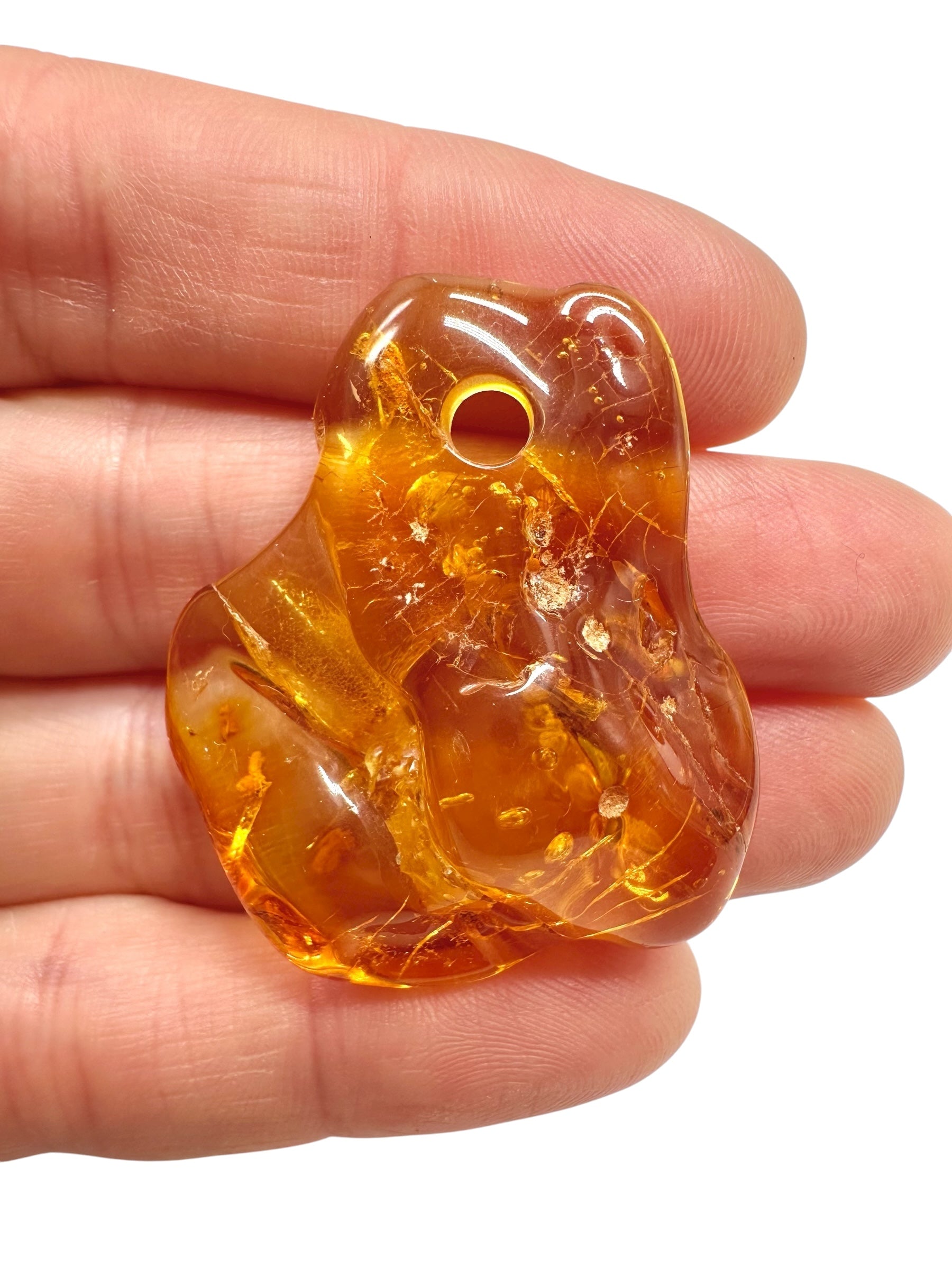 Amber with a drilled hole for hanging 4,4g – Lithuania