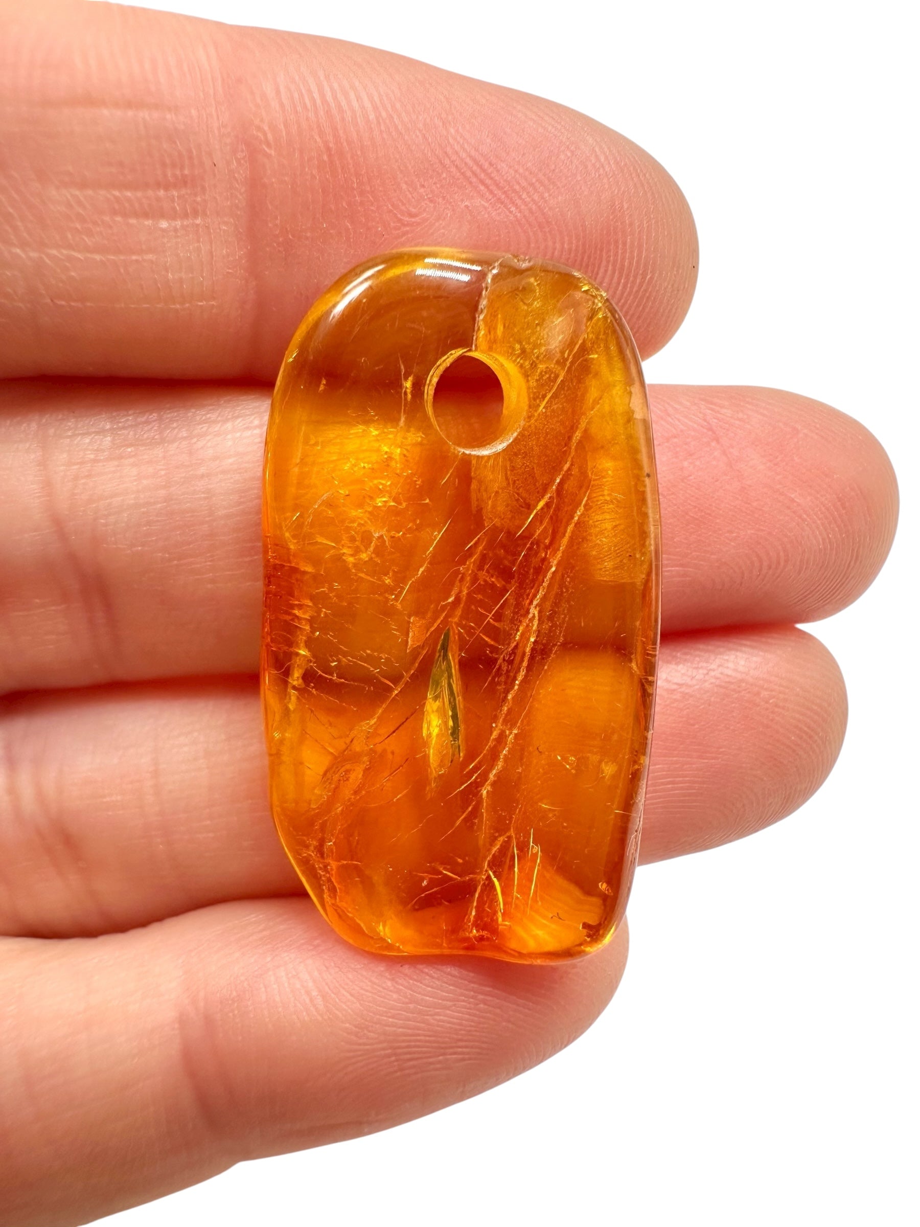 Amber with a drilled hole for hanging 1,8g – Lithuania - JND46