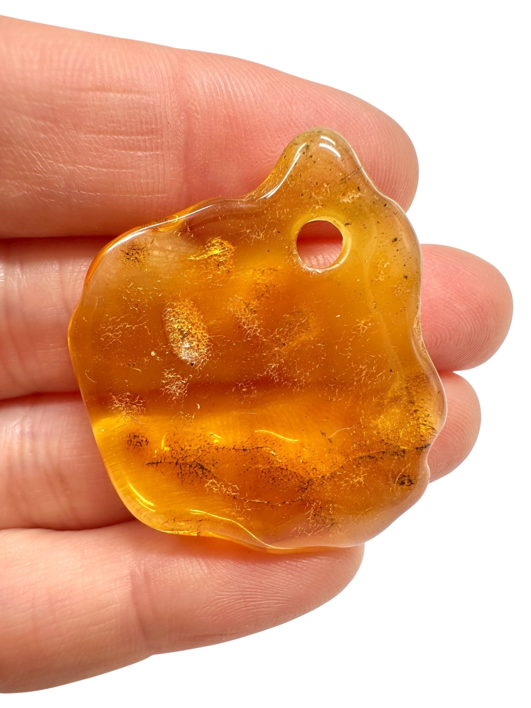 Amber with a drilled hole for hanging 4,3g – Lithuania - JND47