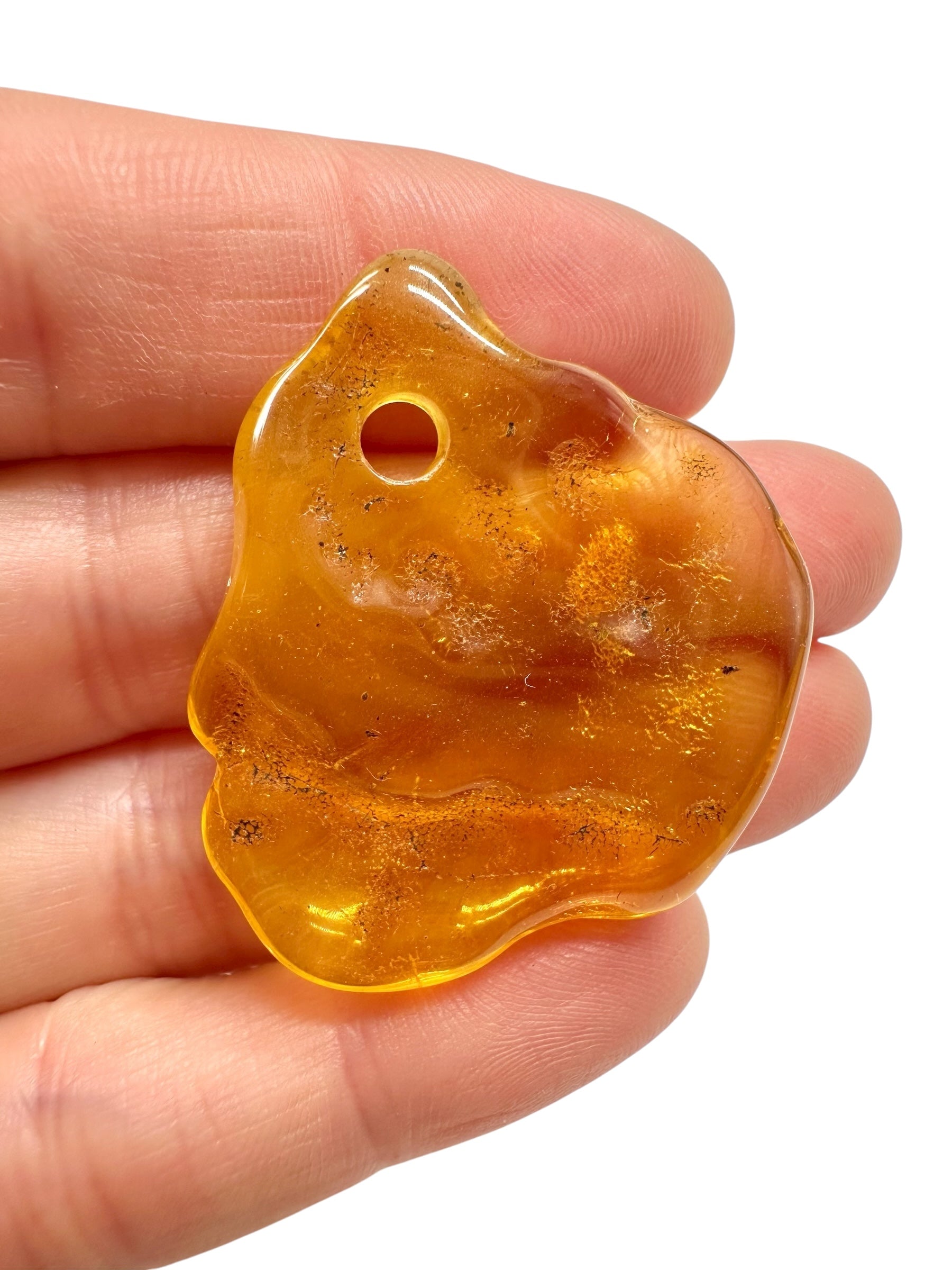 Amber with a drilled hole for hanging 4,3g – Lithuania