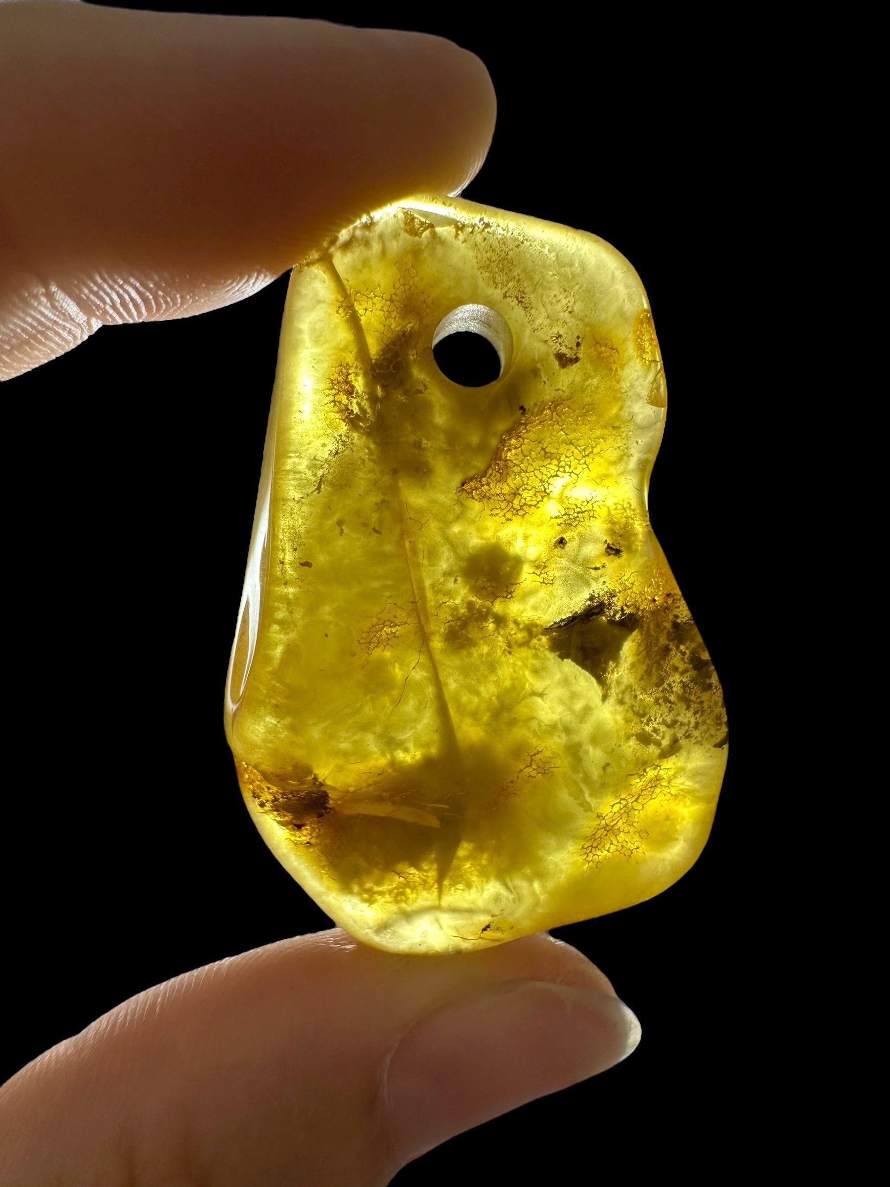 Amber with a drilled hole for hanging 5,7g – Lithuania - JND48