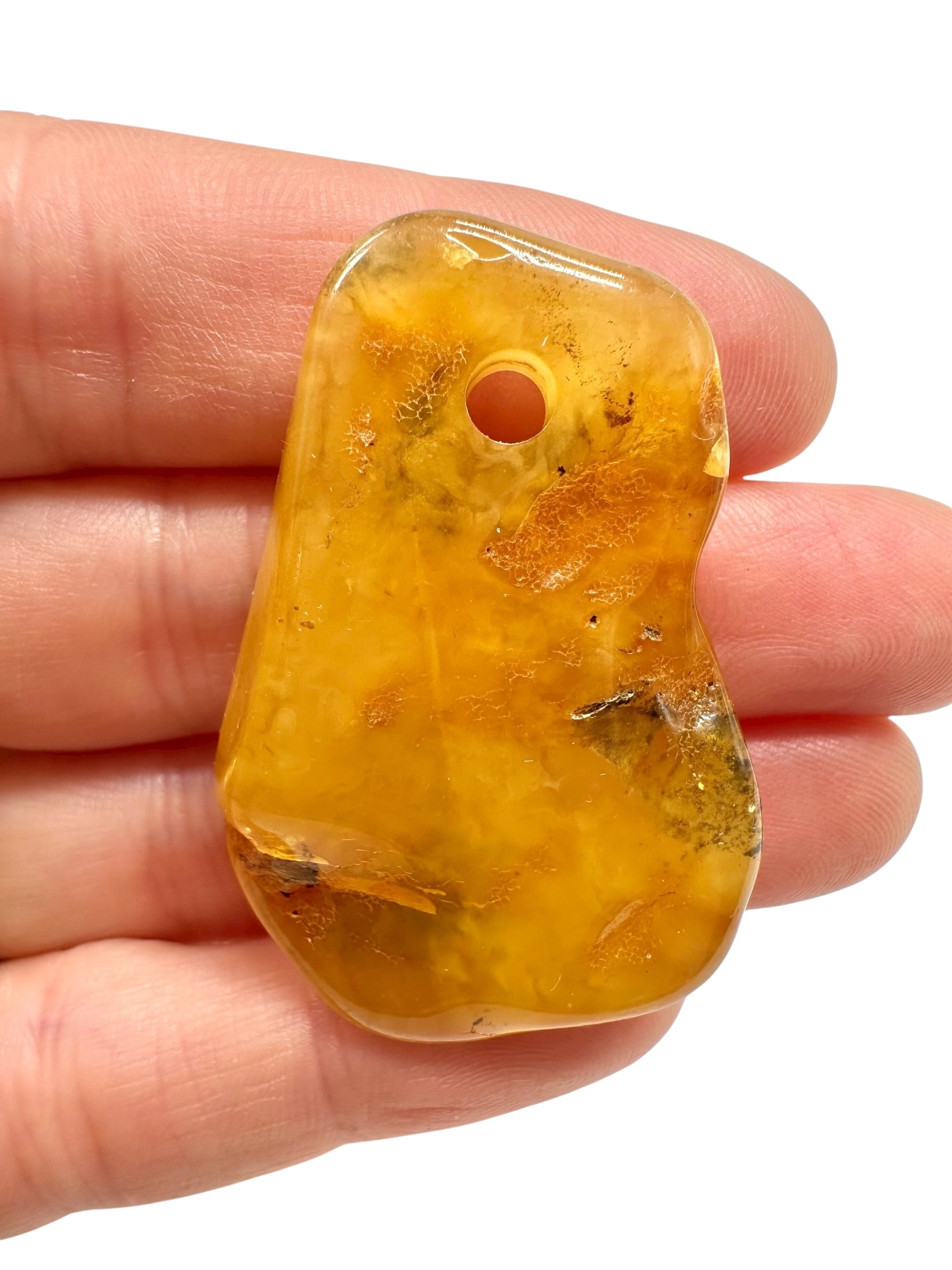 Amber with a drilled hole for hanging 5,7g – Lithuania