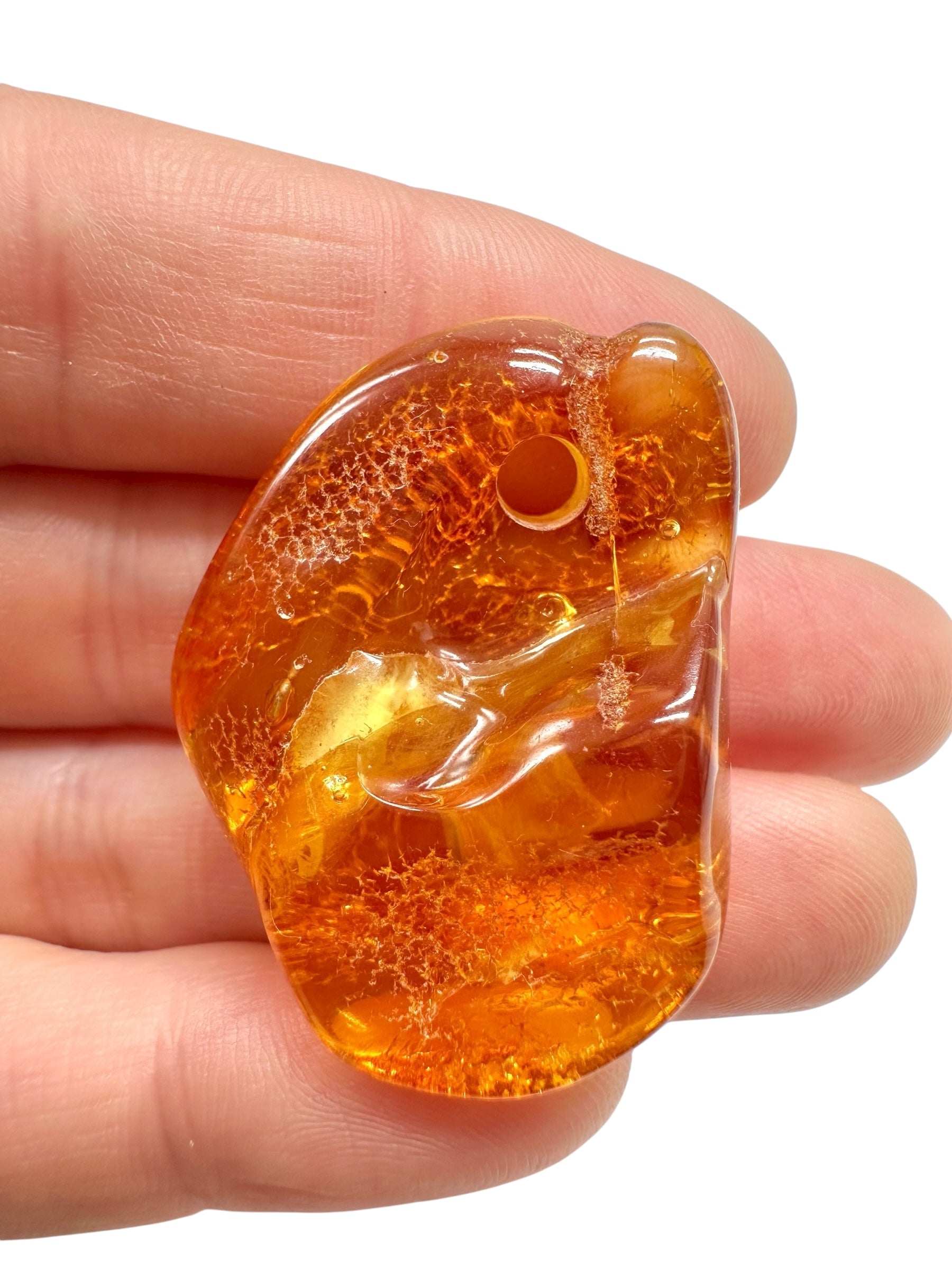 Amber with a drilled hole for hanging 5g – Lithuania - JND50