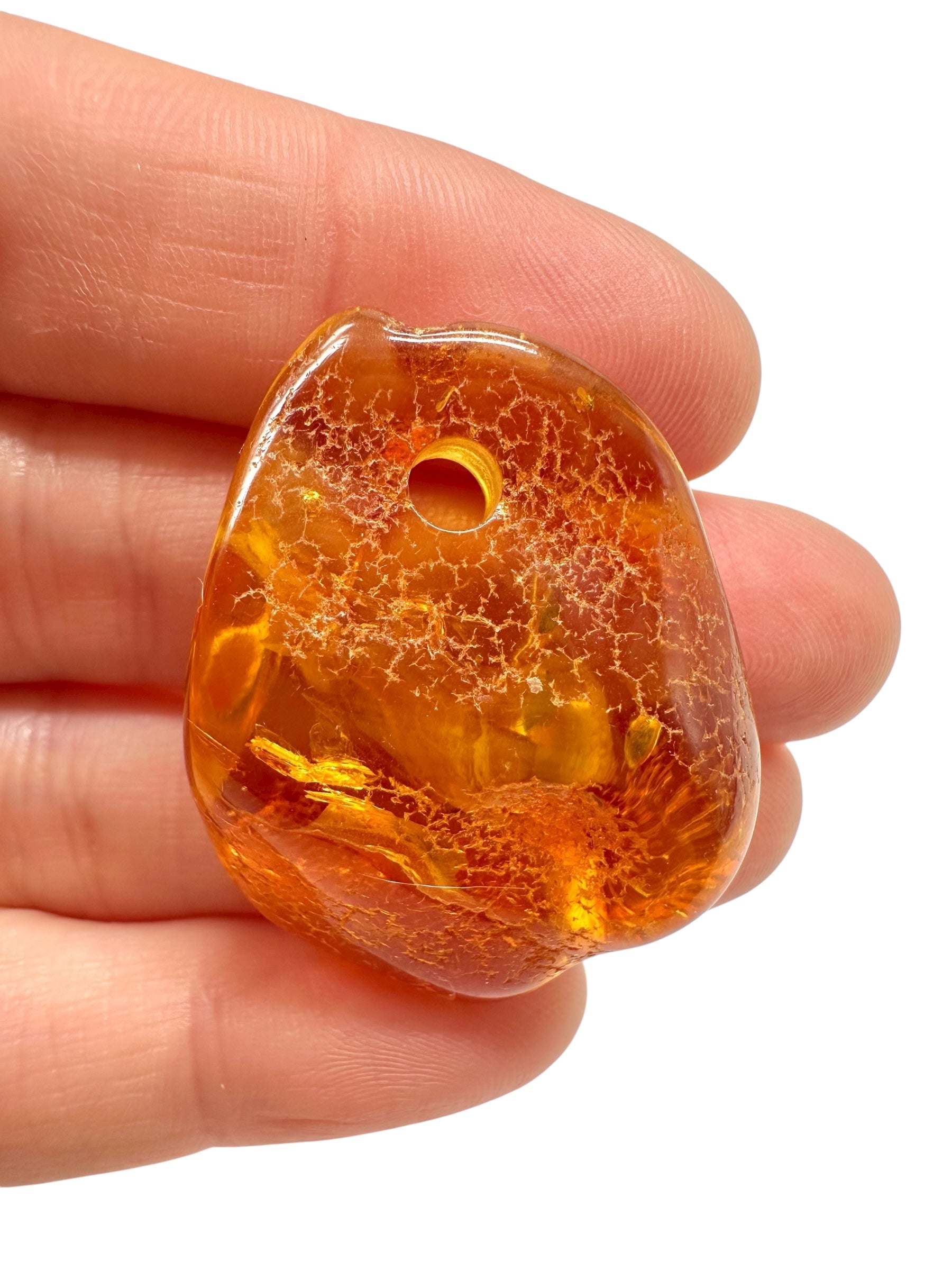 Amber with a drilled hole for hanging 5g – Lithuania
