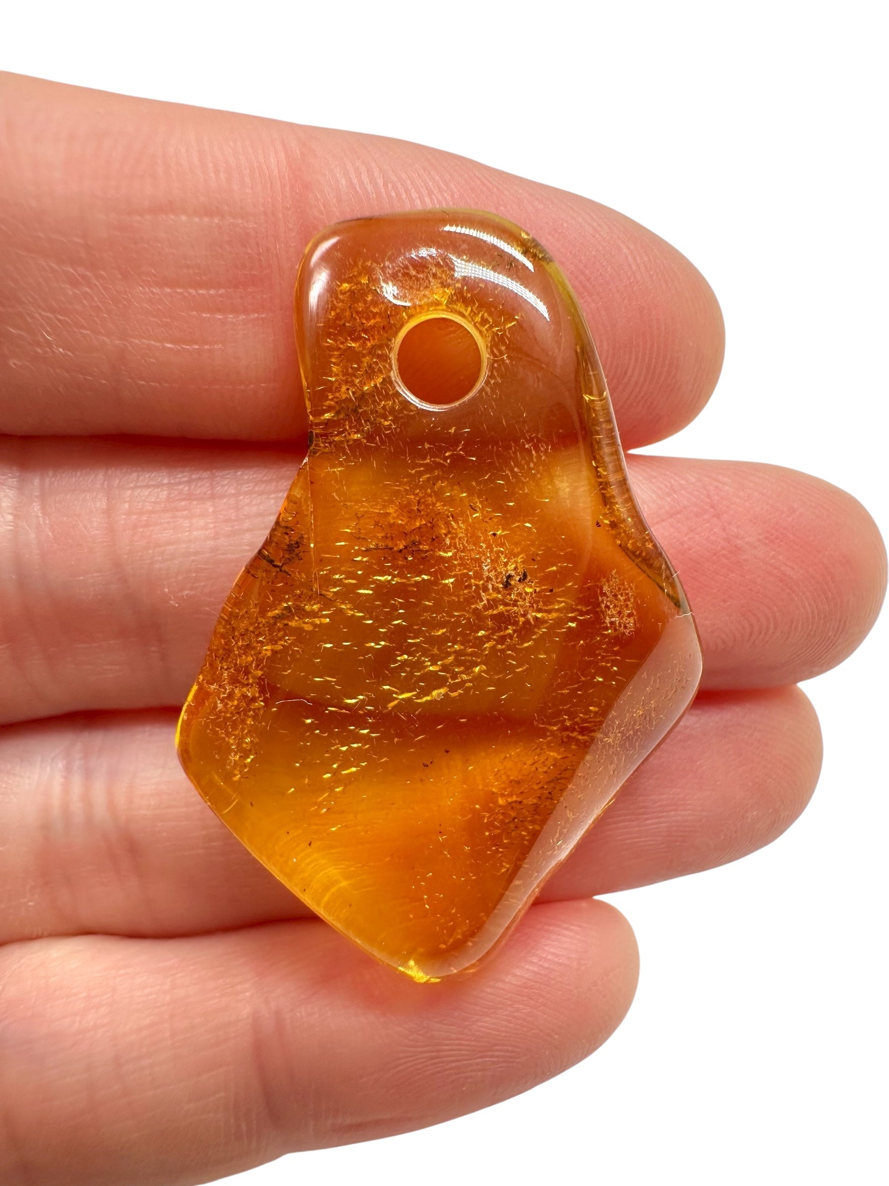 Amber with a drilled hole for hanging 3,7g – Lithuania