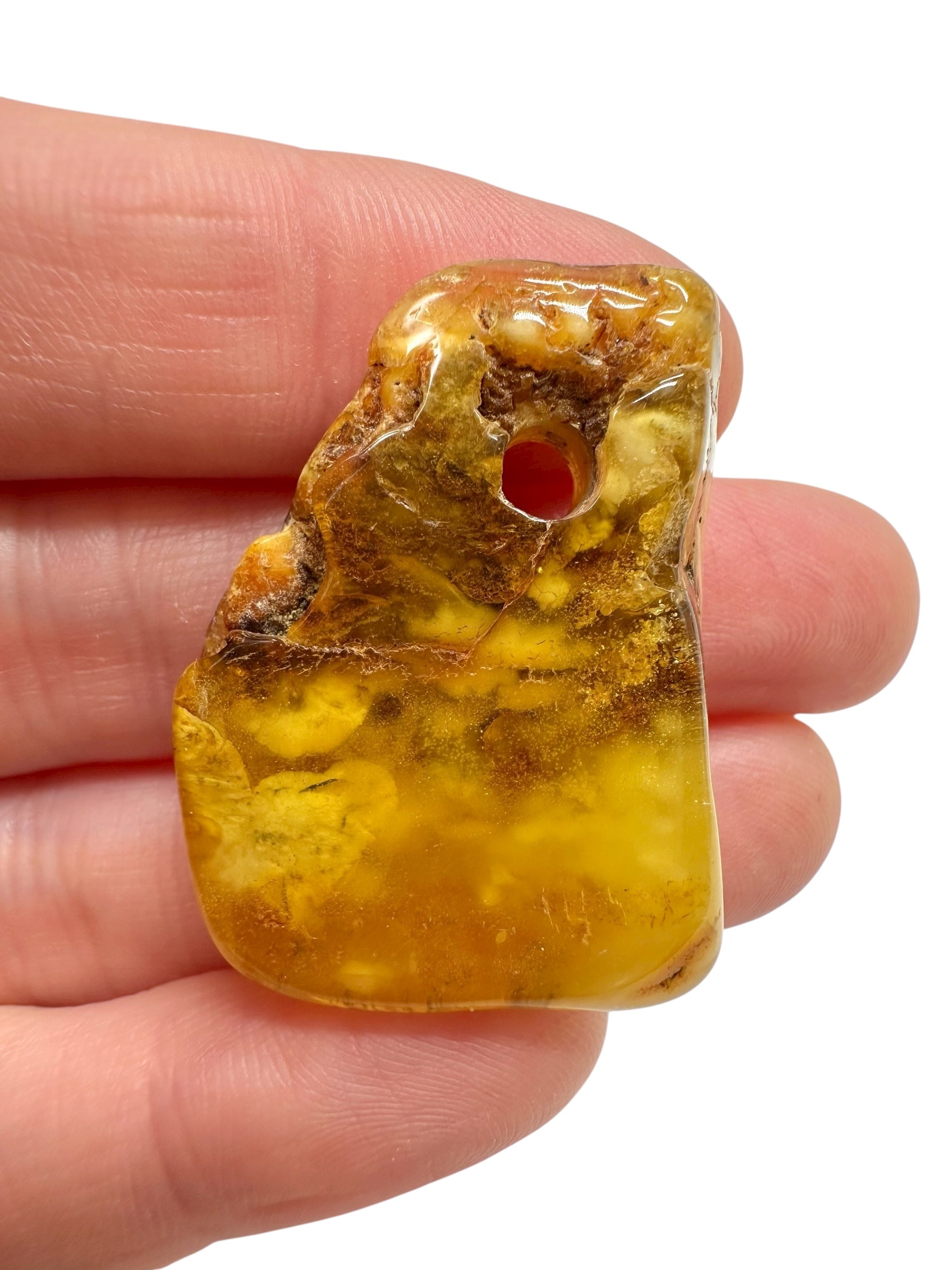 Amber with a drilled hole for hanging 4,5g – Lithuania