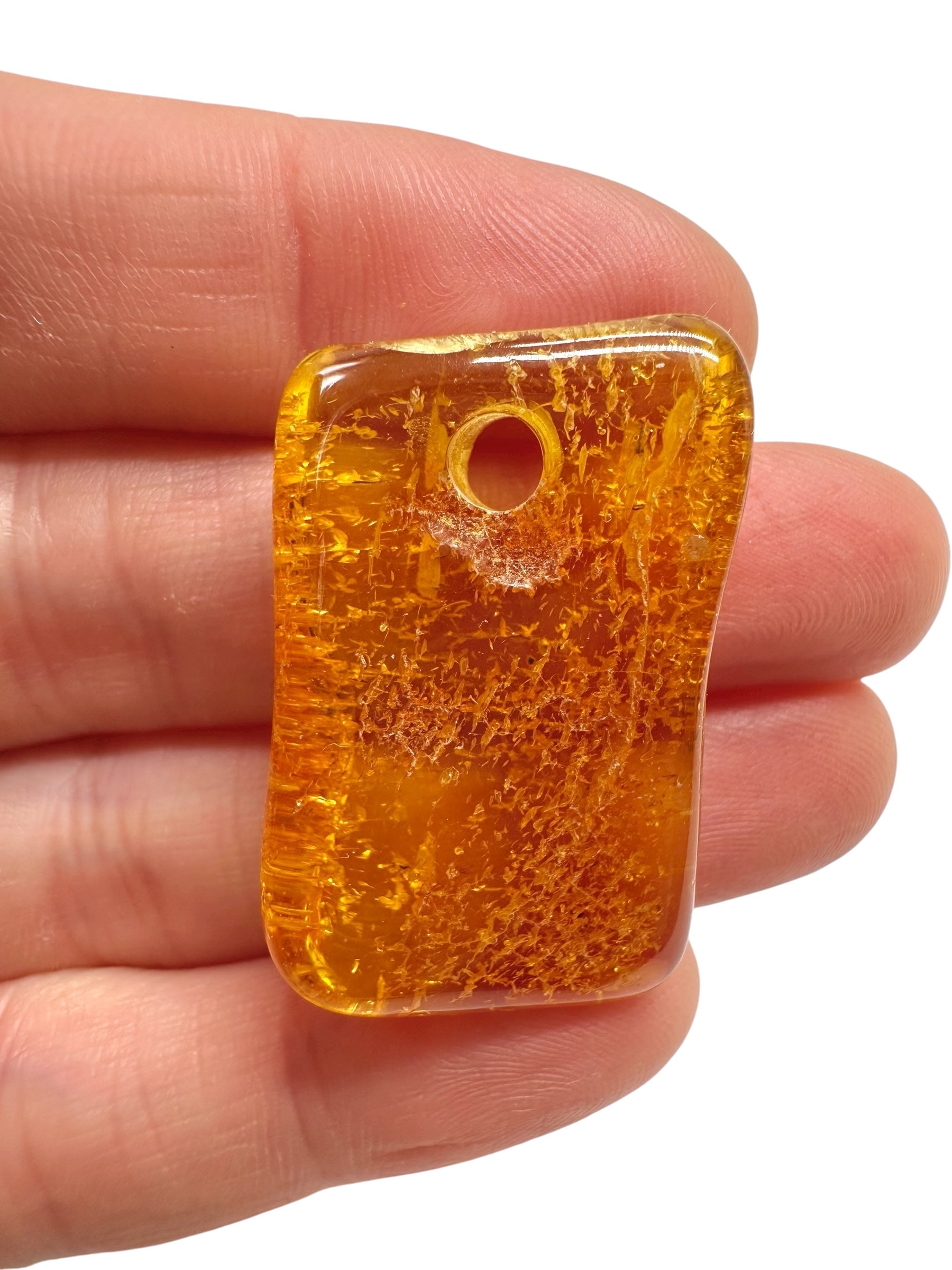 Amber with a drilled hole for hanging 3,9g – Lithuania